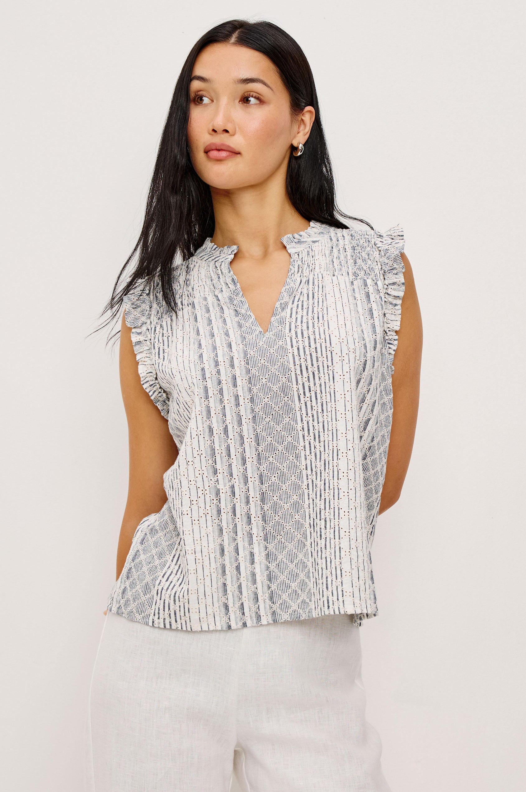 Arlene Sleeveless Top in Luxe Linen With V-Neckline, Pleated Collar, and Smocked Bodice in Striped Eyelet Colorway - Upper Body Front View Featured on Model