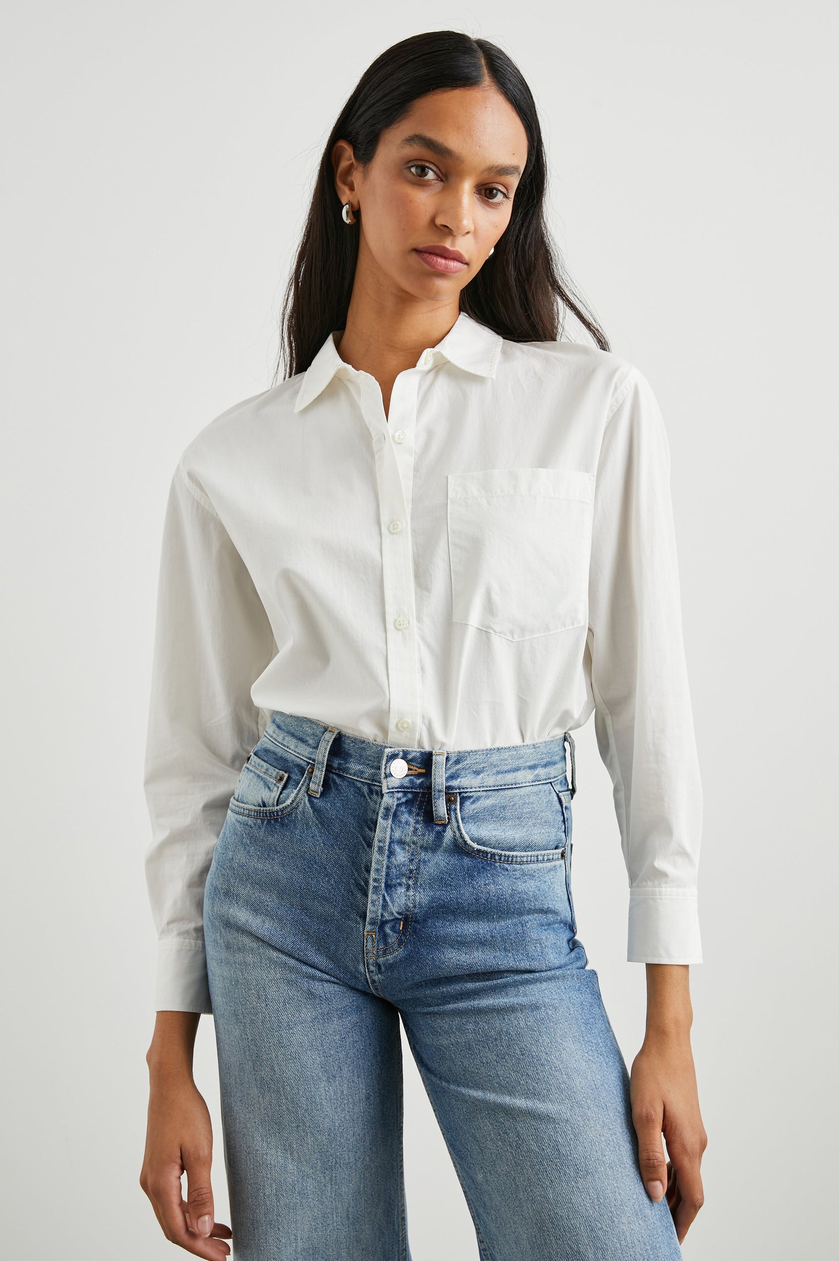 Arlo Long Sleeve Button Up with Chest Patch Pocket in White Colorway - Front Tucked View Featured on Model