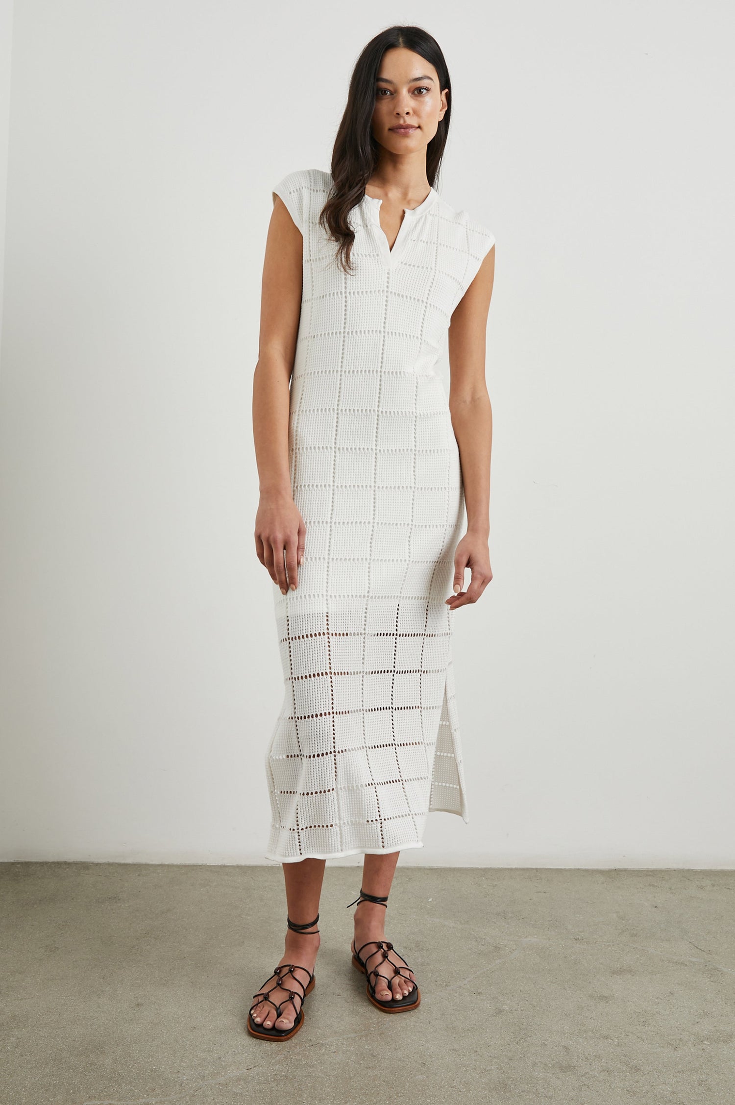 Ashley Short-Sleeve, Open Knit Midi Dress with Cap Sleeves, a V Neck Placket and a Side Slit in White Colorway - Front Full Body View Featured on Model 