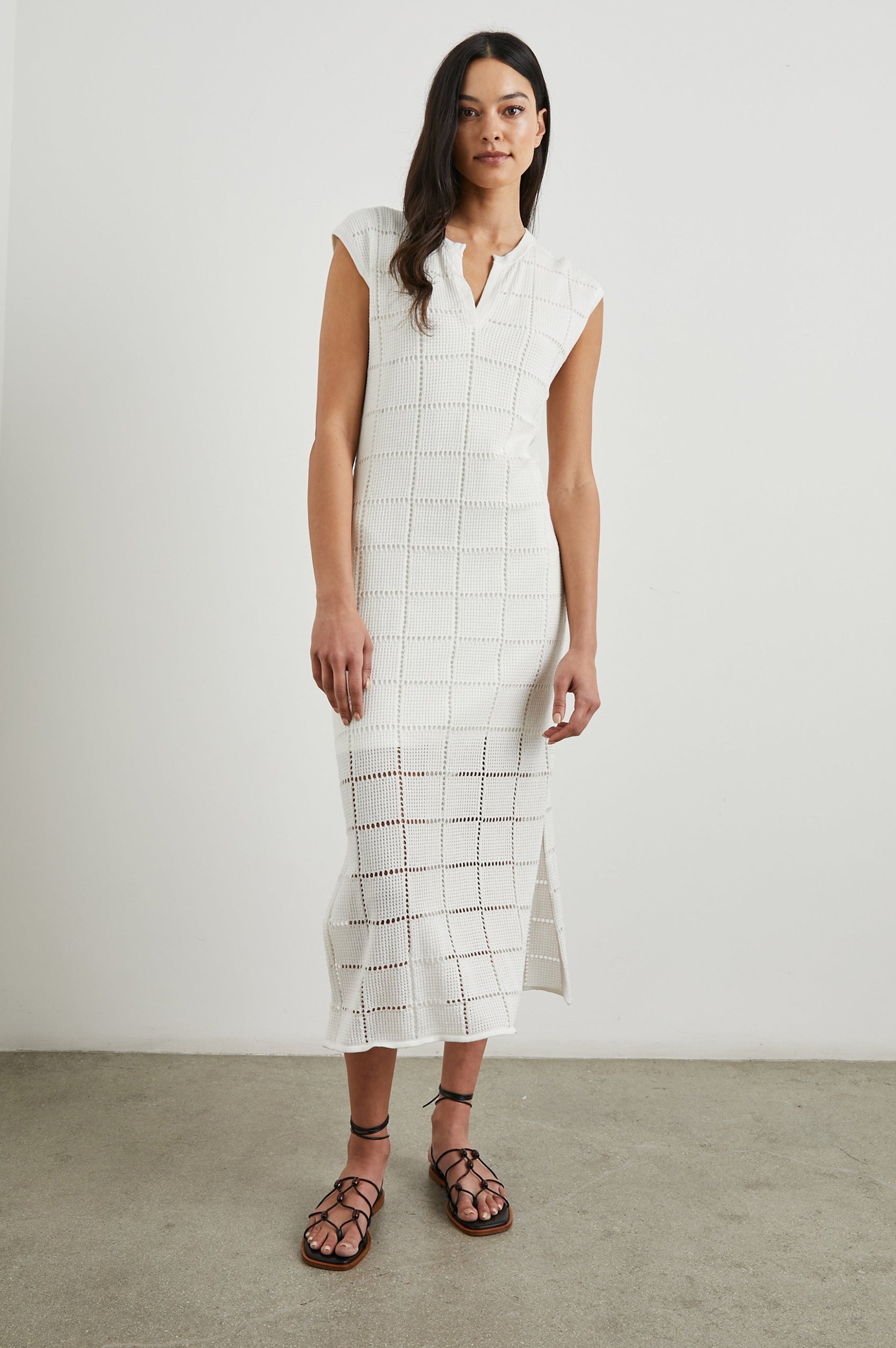 Ashley Short-Sleeve, Open Knit Midi Dress with Cap Sleeves, a V Neck Placket and a Side Slit in White Colorway - Front Full Body View Featured on Model 