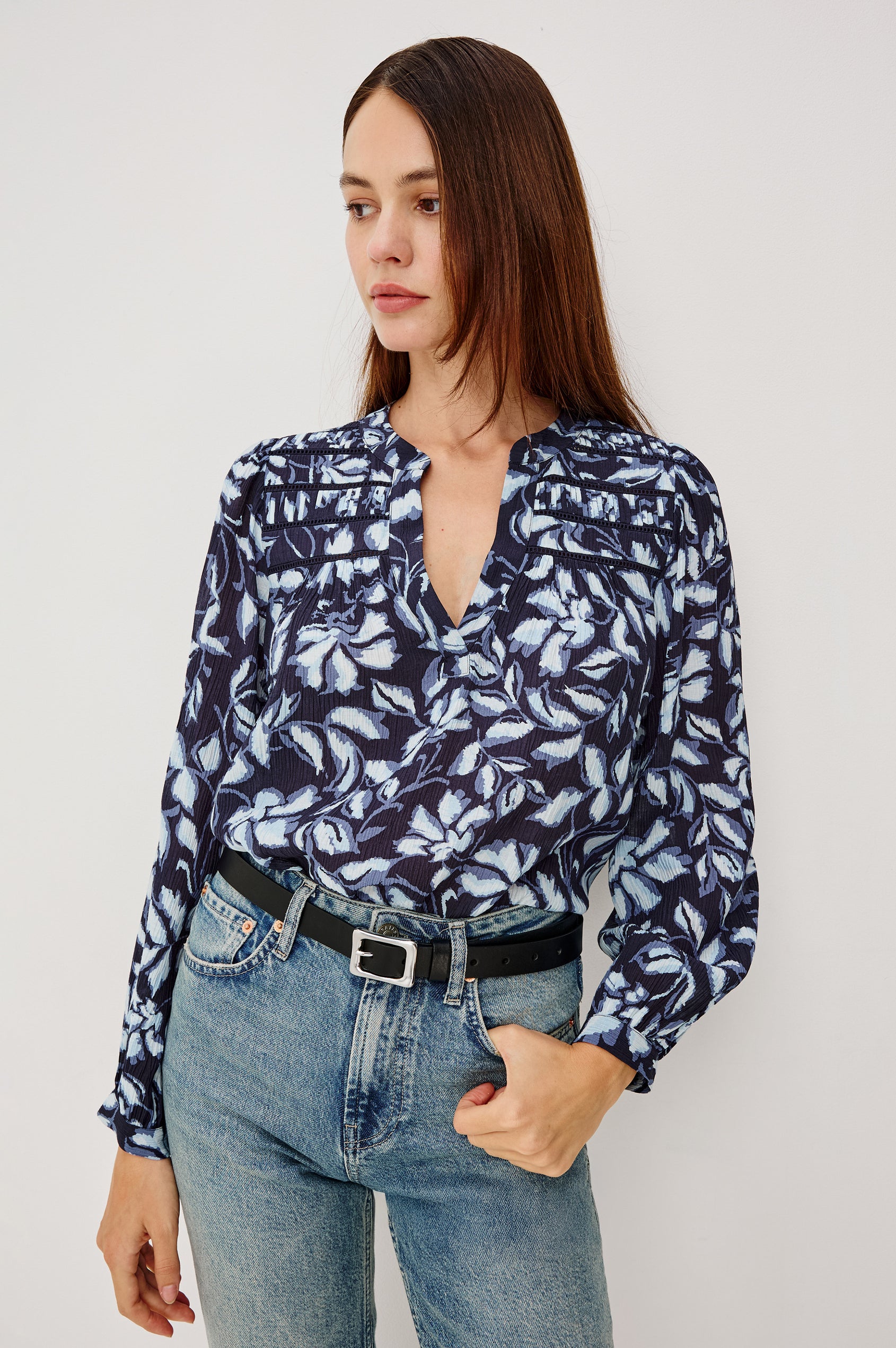 Asta Top in Floral Print Pleated Chiffon With V-Neckline, Inset Ladder Trim at Yoke, and Long Billowing Sleeves With Fitted Cuffs in Navy Jasmine Colorway - Upper Body Front View Featured on Model