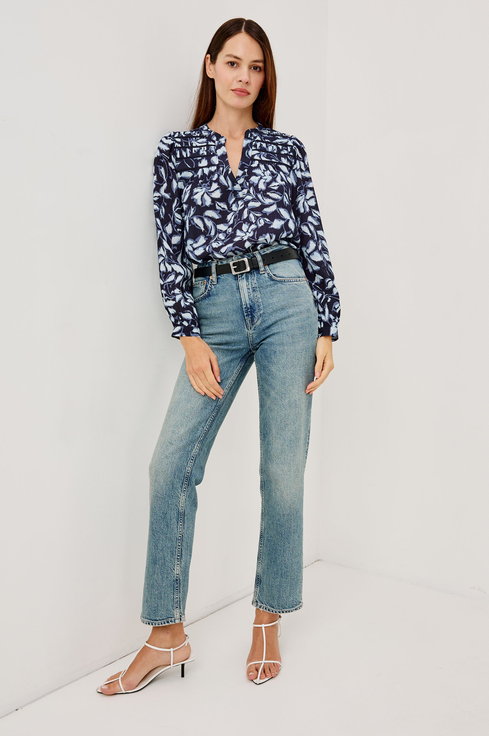 Asta Top in Floral Print Pleated Chiffon With V-Neckline, Inset Ladder Trim at Yoke, and Long Billowing Sleeves With Fitted Cuffs in Navy Jasmine Colorway - Full Body Front View Featured on Model