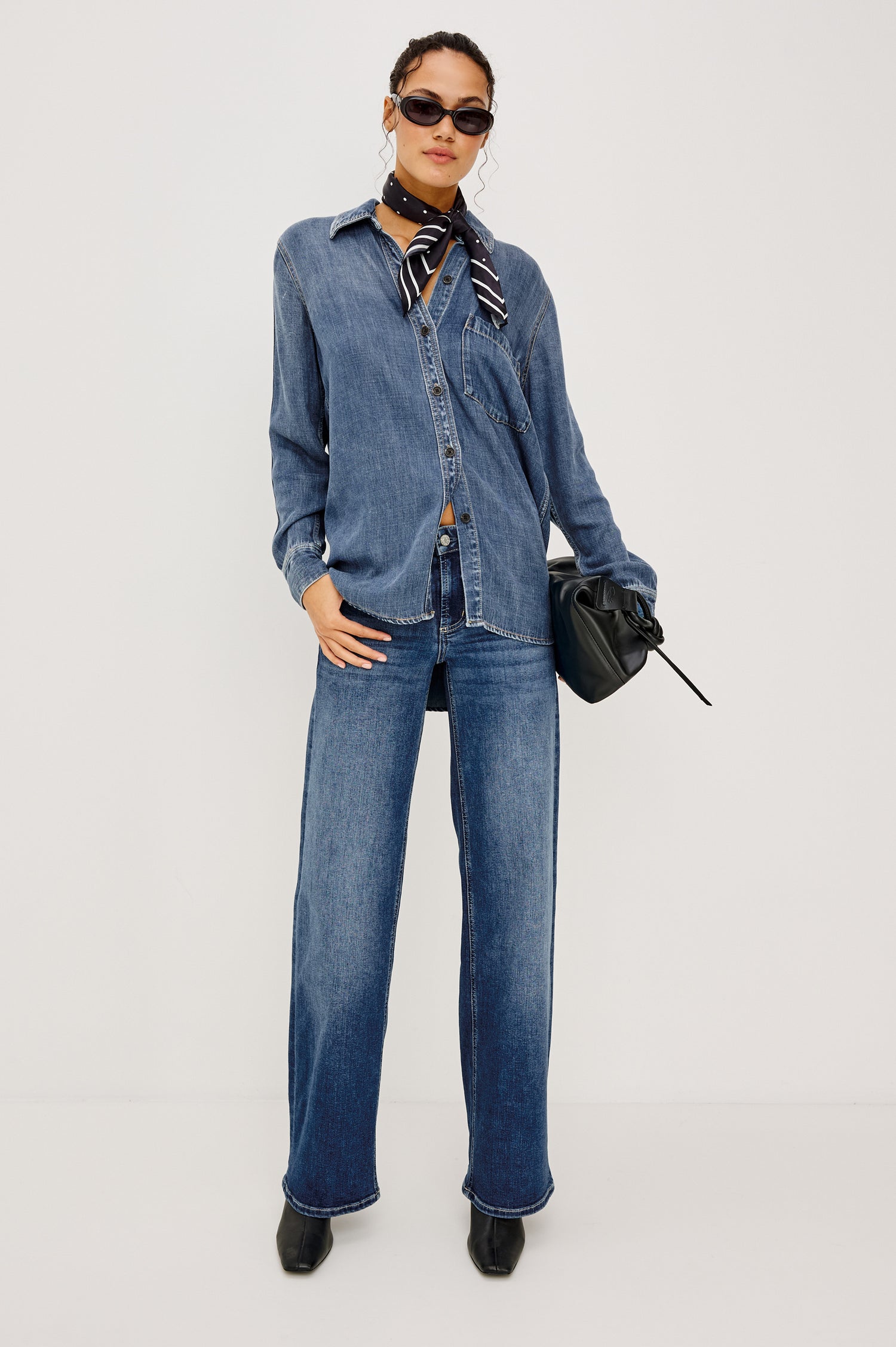 Atticus Shirt in Cotton Lyocell Denim With Collar, Long Sleeves, and Chest Patch Pocket in Antique Blue Colorway - Full Body Front View Featured on Model