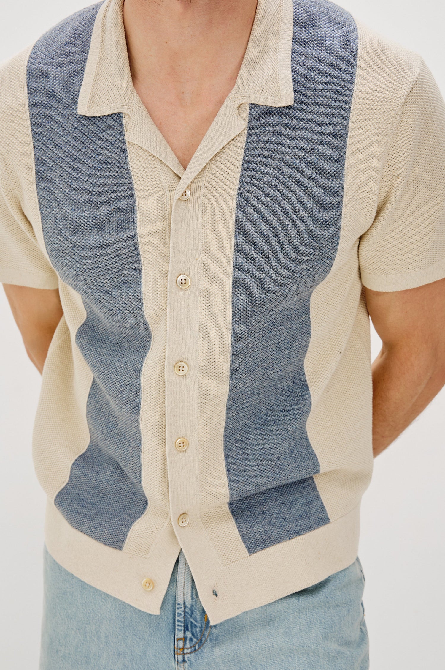 Atwood Button Front Knit Shirt with a Soft Open Lapel, Short Sleeves in Ecru Chambray Colorway. Front Detail View Shown on Model.
