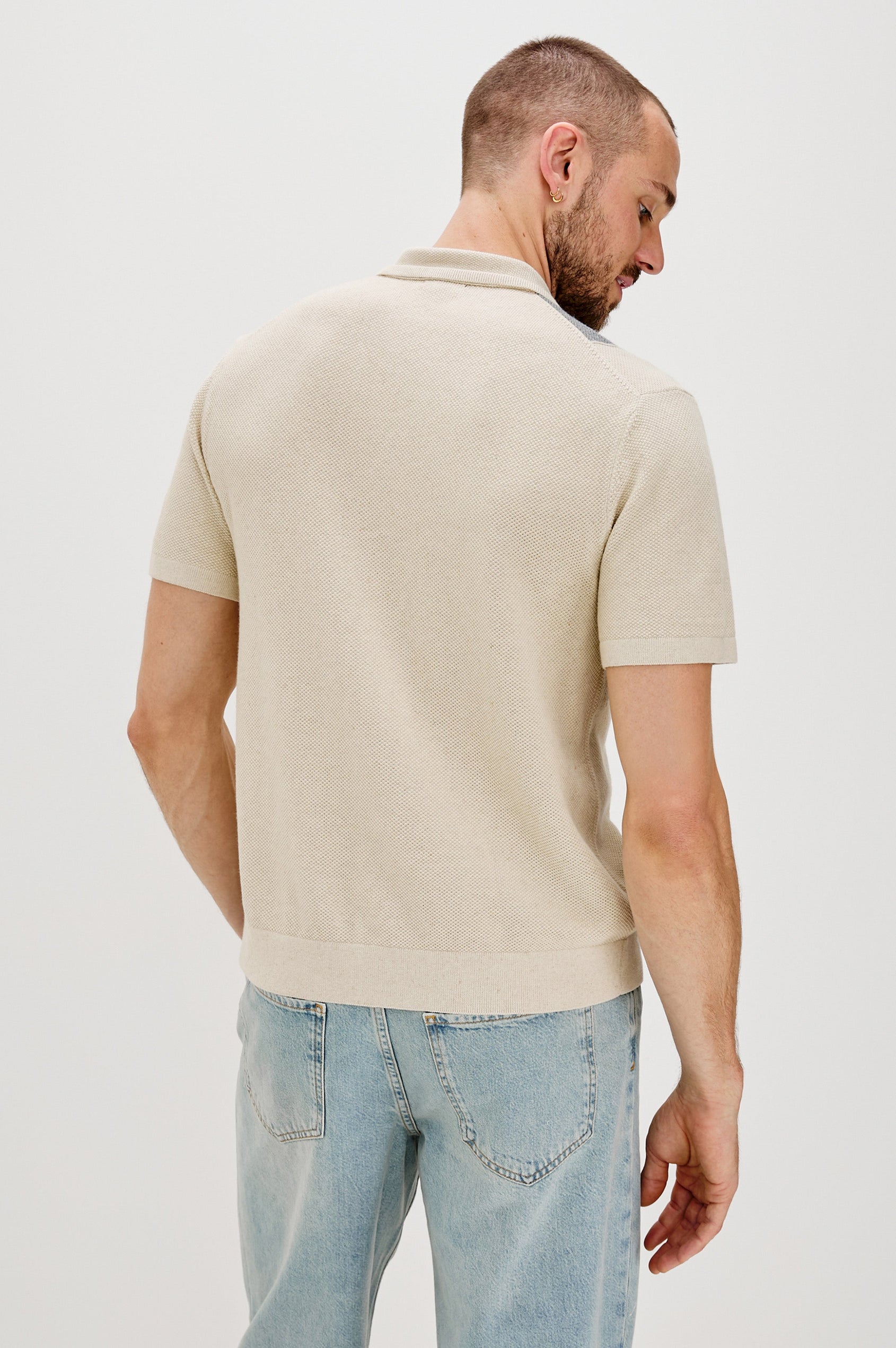 Atwood Button Front Knit Shirt with a Soft Open Lapel, Short Sleeves in Ecru Chambray Colorway. Back View Shown on Model.