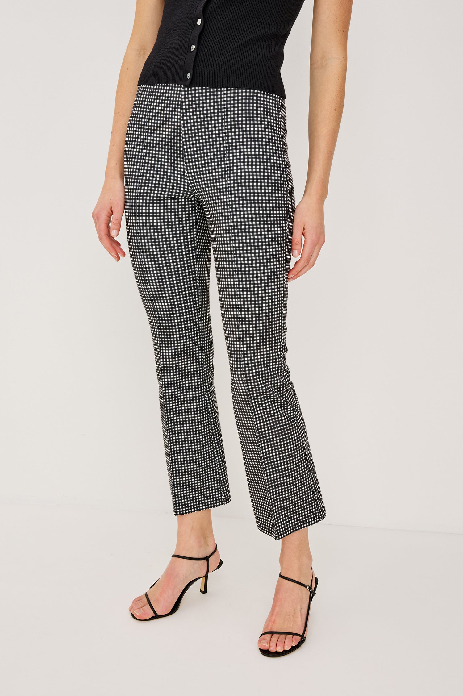 Auray High-Waisted Pant in Ponte With Pintuck Front Seams Cropped Legs Elastic Waistband and Kick Flare in Black Colorway - Lower Body Front View Featured on Model
