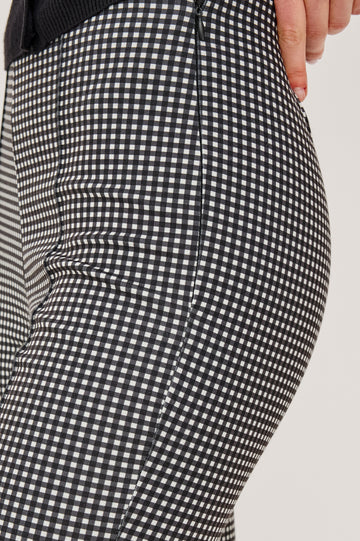 Auray Pant in Ponte With High-Waisted Fit Front Pintuck Detailing Cropped Length Elastic Waistband and Kick Flare at Hem in Black Gingham Colorway - Lower Body Close Up View Featured on Model