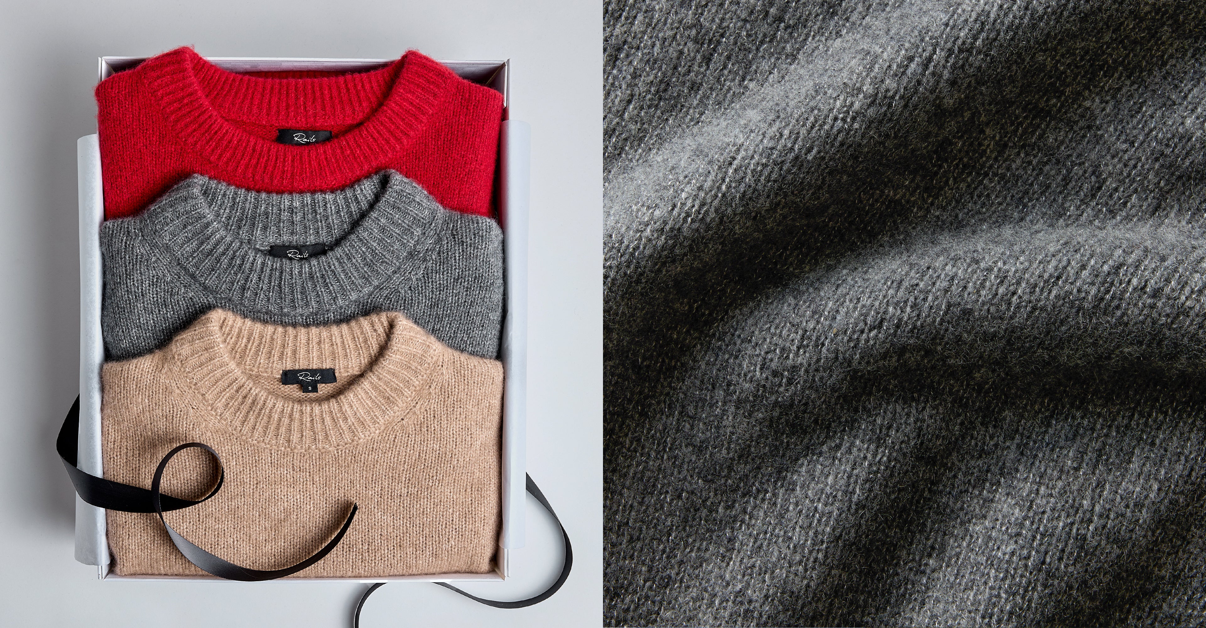EDITORIAL IMAGE OF MULTIPLE CASHMERE SWEATERS FOLDED IN A GIFT BOX
