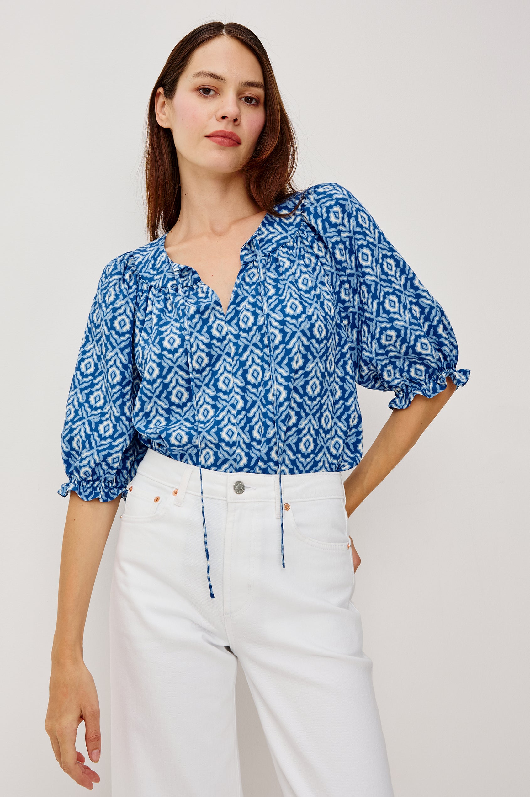 Belina Top With Gathrered V-Neck With Self-Ties Elbow Length Sleeves in Blue Ikat Colorway - Upper Body Front View Featured on Model