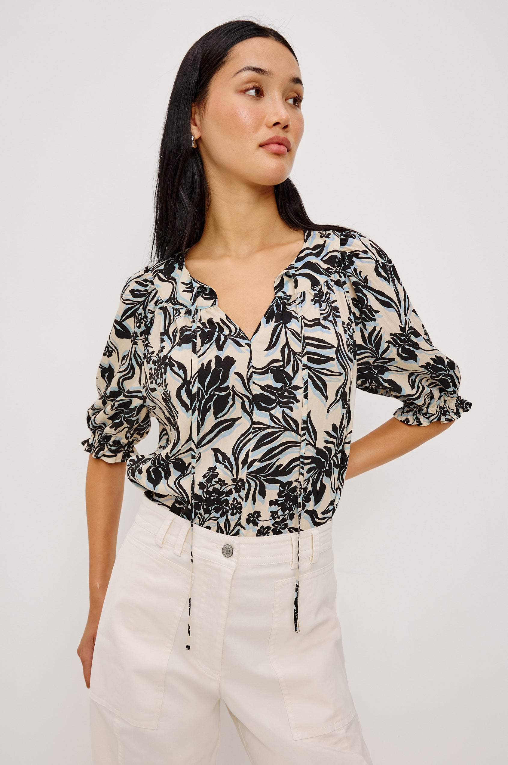 Belina Peasant Top in Crinkle Poplin With Gathered V-Neckline With Self Ties, Blanket Stitch Embroidered Trim, Loose Fit, and Elbow-Length Puff Sleeves With Elastic Cuffs in Zinya Colorway - Upper Body Front View Featured on Model