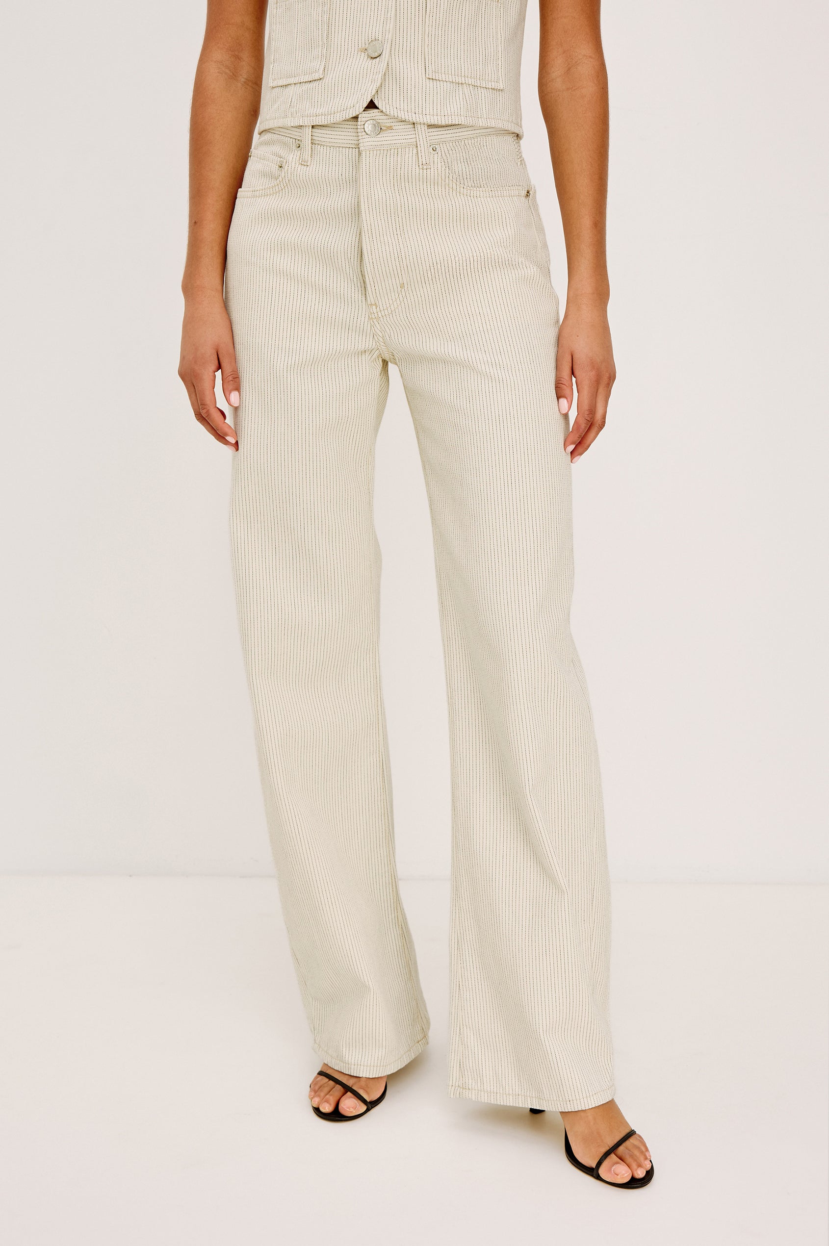 Belmont Arc Leg Jean in Rigid Denim With High-Waisted Fit, Button Fly, and 32″ Inseam in Ecru Railroad Stripe Colorway - Lower Body Front View Featured on Model