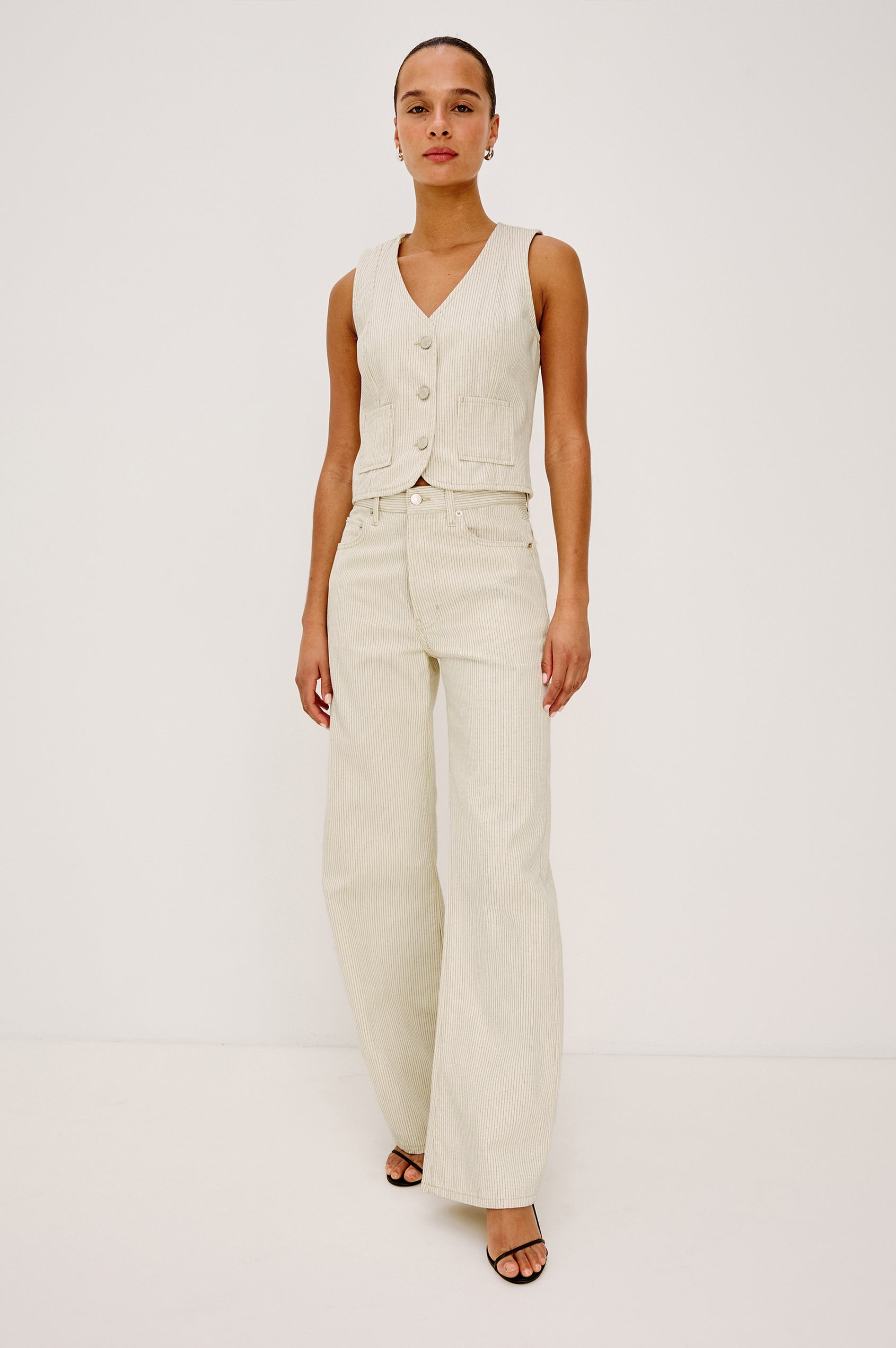 Belmont Arc Leg Jean in Rigid Denim With High-Waisted Fit, Button Fly, and 32″ Inseam in Ecru Railroad Stripe Colorway - Full Body Front View Featured on Model