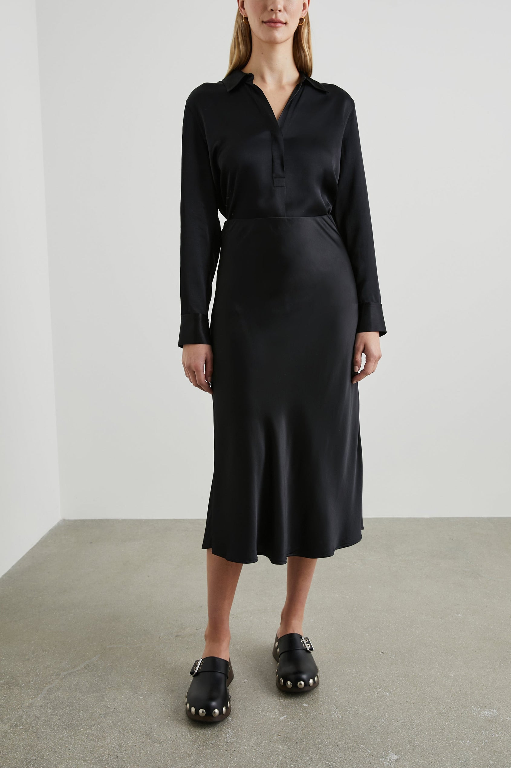 Berlin Midi Skirt in Black Colorway - Front Full Body View Featured on Model