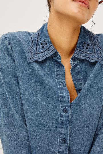 Bethany Button-Up Shirt in TENCELâ„¢ Denim With an Embroidered Collar Long Sleeves and Loose Fit in Antique Blue Colorway - Upper Body Close Up View Featured on Model