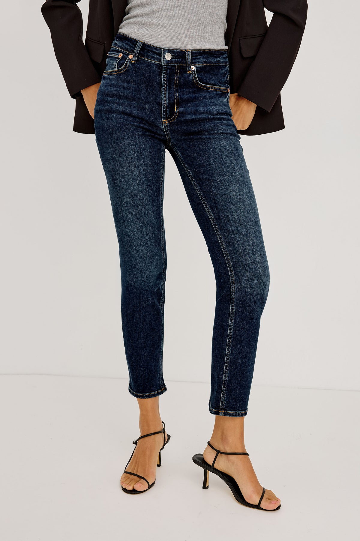 Bixby is a 5-pkt slim straight jean in Deep Dive colorway. Back view featured on model.