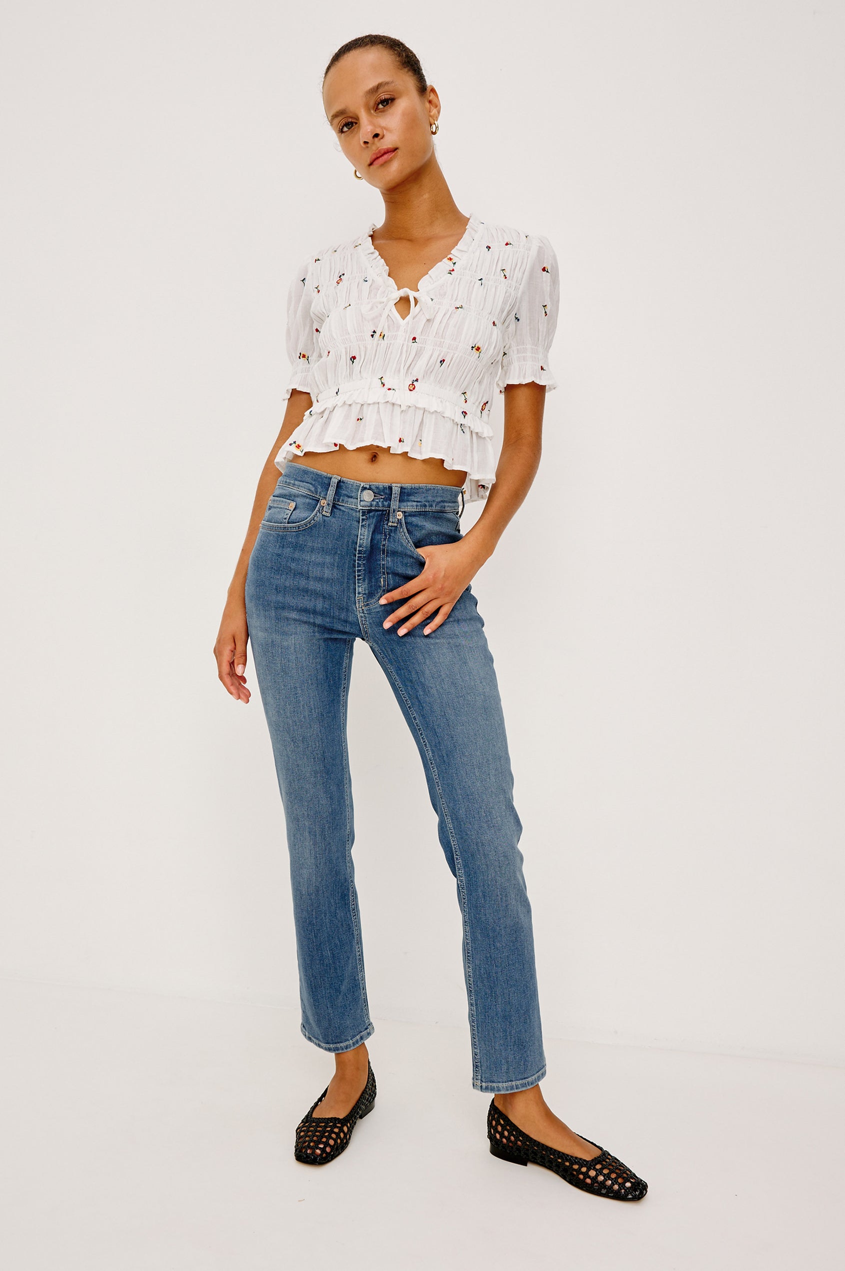 Bixby Mid-Rise Slim Straight Jean in High Stretch Denim With 28″ Inseam, Zip Fly, and 5-Pockets in East Coast Colorway - Full Body Front View Featured on Model