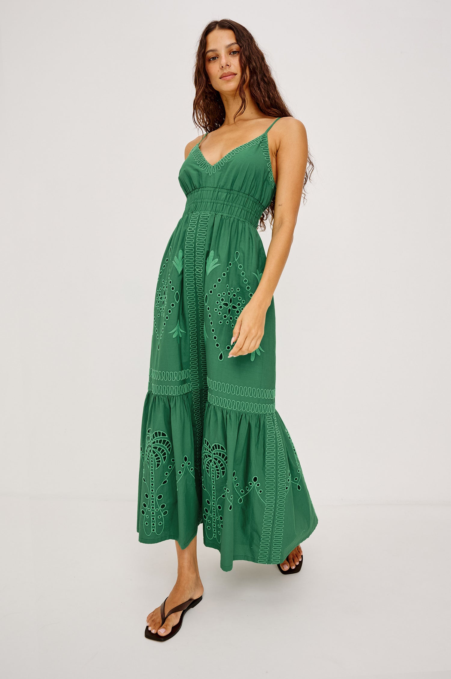 Blair Maxi Dress in Cotton Poplin With V-Neckline, Adjustable Spaghetti Straps, Elastic Waist Paneling, Soutache Tropical Embroidery, Back Smocking, Adjustable Shoulder Straps, and is Fully Lined in Clover Colorway - Full Body Front View Featured on Model