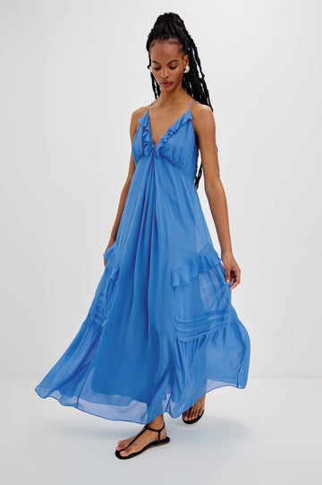 Boa Maxi Tank Dress with Spaghetti Straps, a V-Neck and Ruffle Details in French Blue Colorway. Full Body Front View Shown on Model.