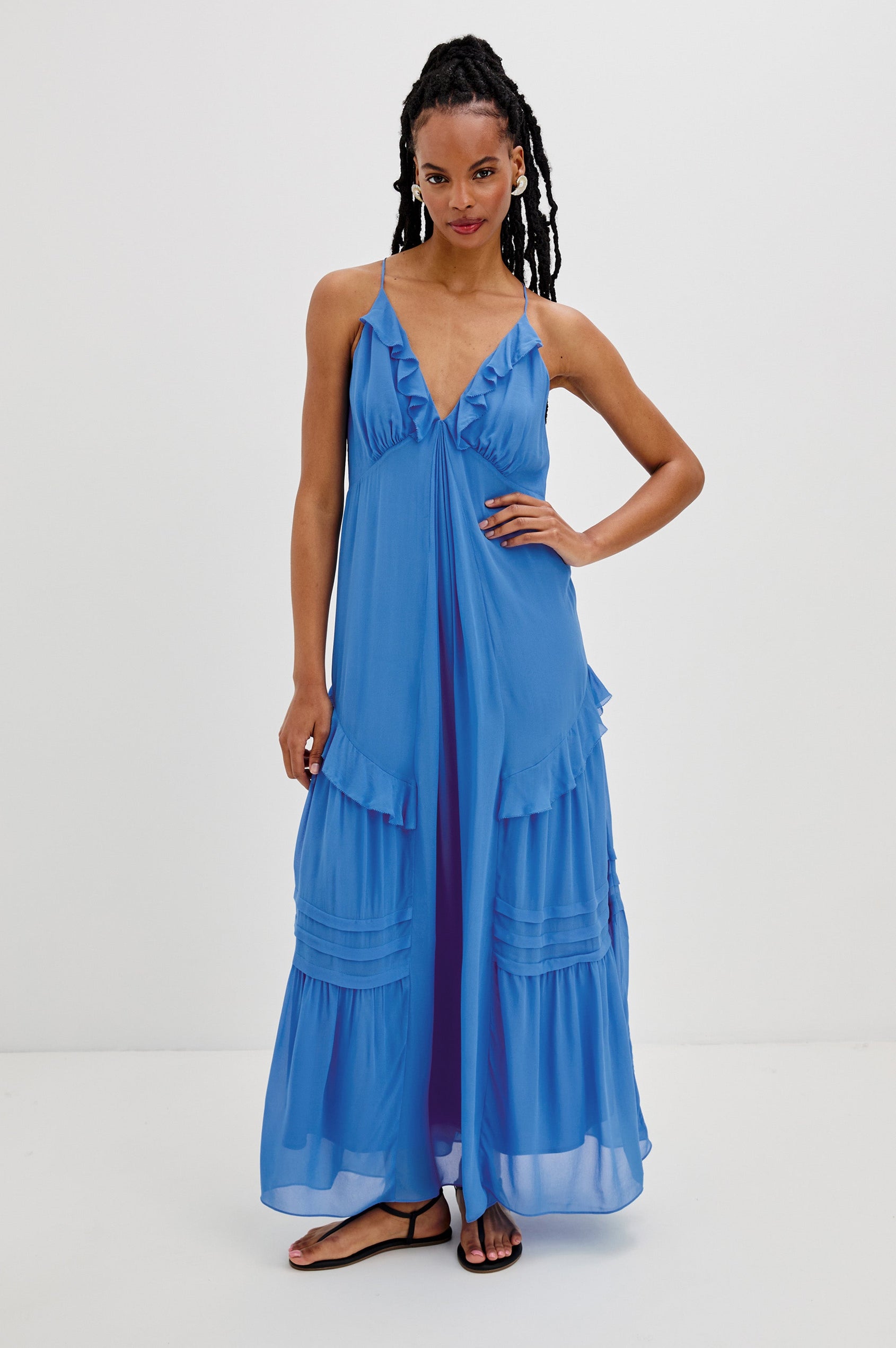 Boa Maxi Tank Dress with Spaghetti Straps, a V-Neck and Ruffle Details in French Blue Colorway. Full Body Front View Shown on Model.