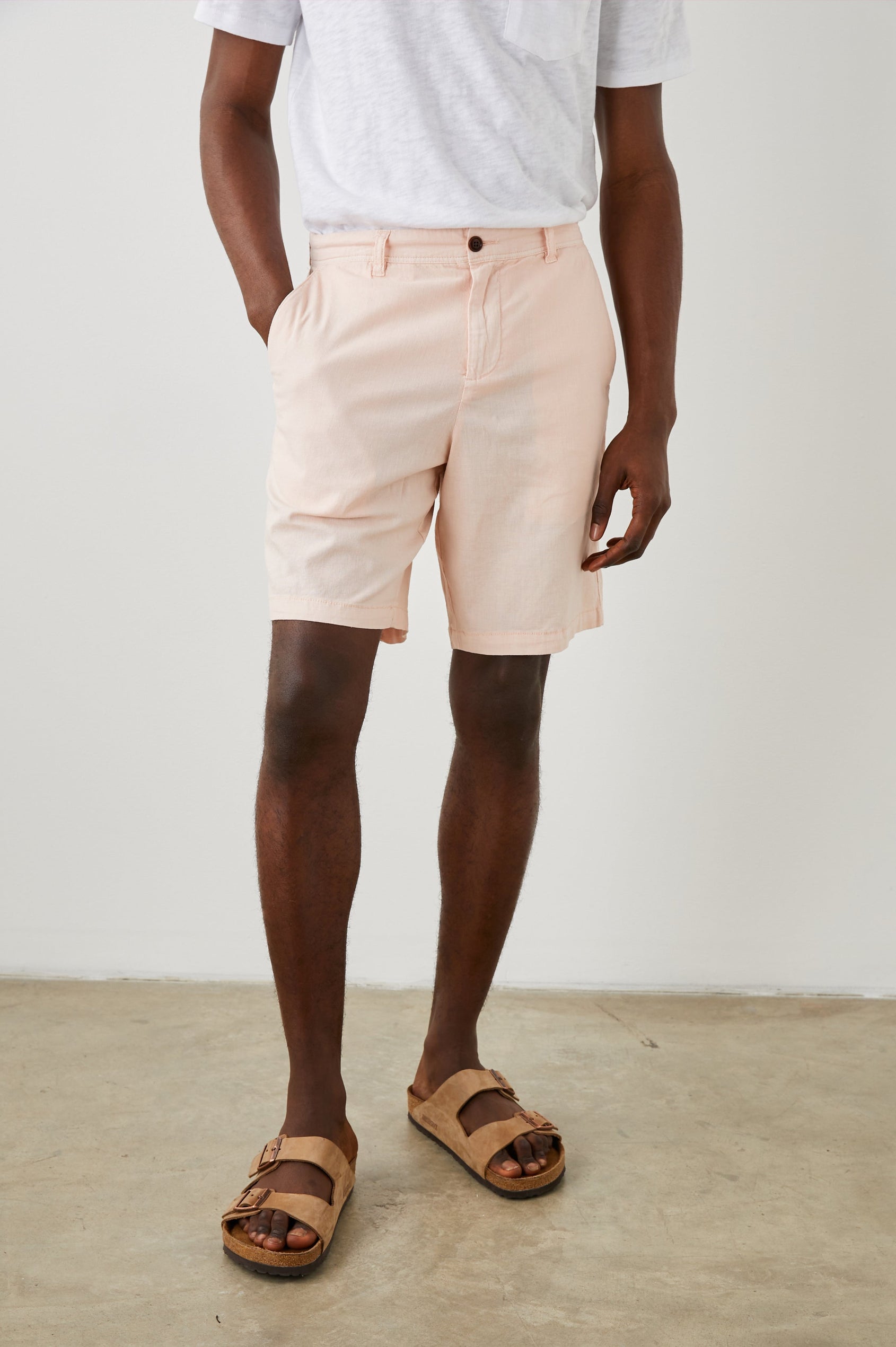 Boden Knee-Length Shorts with Belt Loops, Two Front Pockets and Two Back Button Welt Pockets in Prawn Colorway - Front View Featured on Model