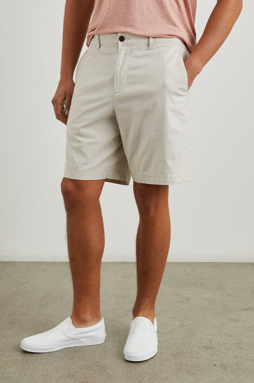 Boden Knee-Length Shorts with Belt Loops, Two Front Pockets and Two Back Button Welt Pockets in Stone Colorway - Front View Featured on Model