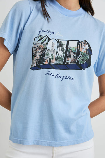 Boyfriend T-Shirt with a Crew Neck, photographs of Los Angeles and the text, Greetings From Rails Los Angeles in Rails Los Angeles Blue Colorway, with text in Blue and White - Front View Featured on Model