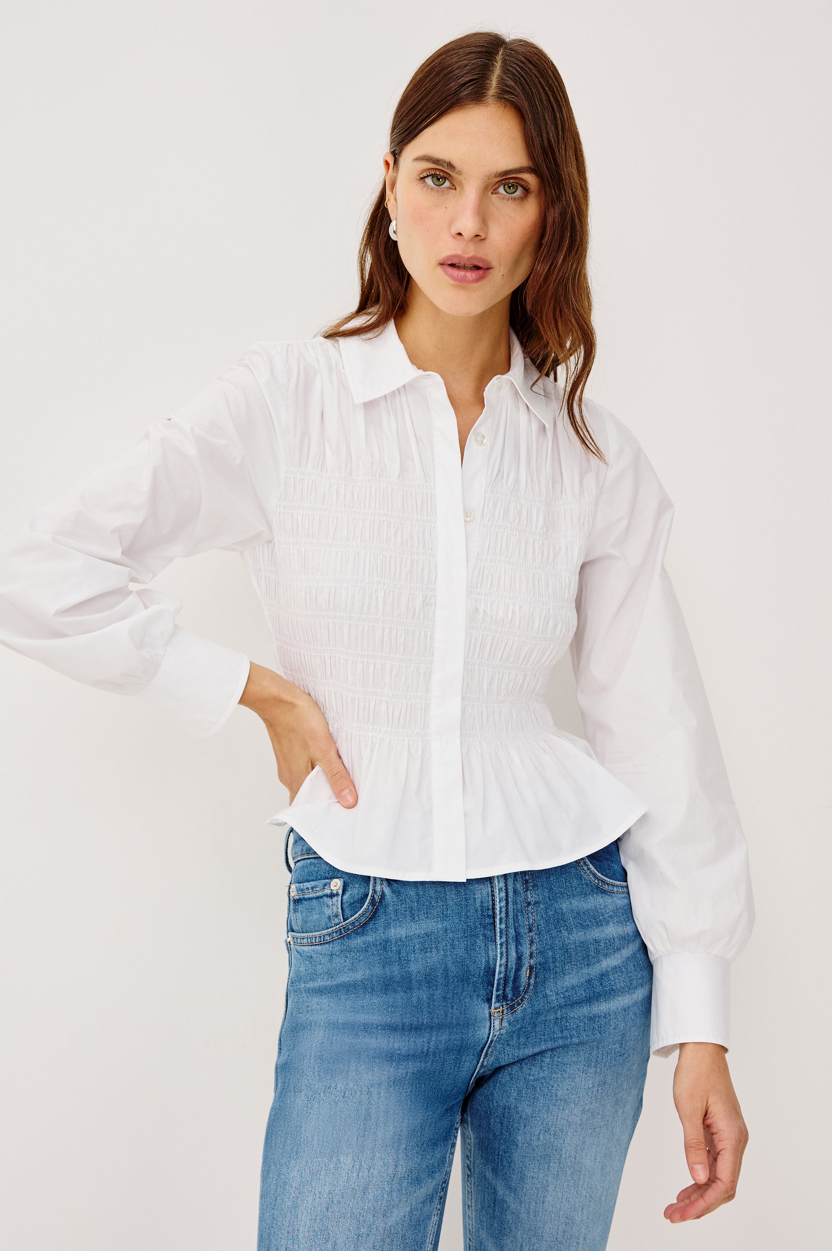 Bradshaw Button-Up Shirt in Cotton Poplin With Collar, Smocked Body, Peplum Hem, and Long Gathered Sleeves in White Colorway - Upper Body Front View Featured on Model