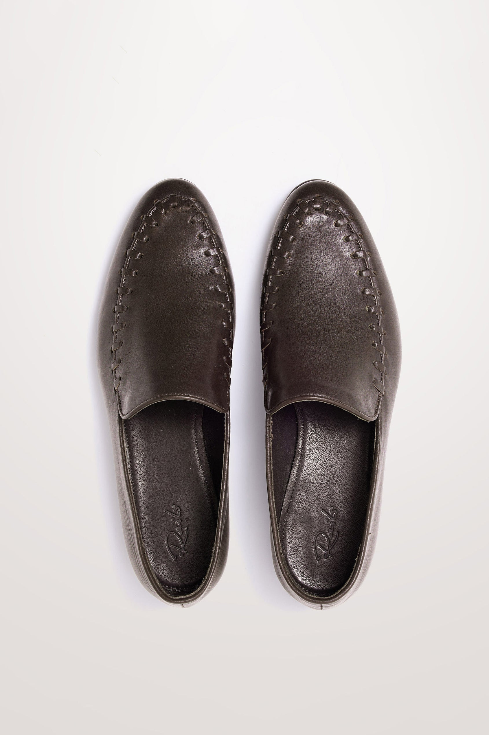 Braga Loafer in Full-Grain Leather With Whipstitch Trim, Narrow Vamp, and Low Heel in Dark Brown Colorway - Top Product View Featured