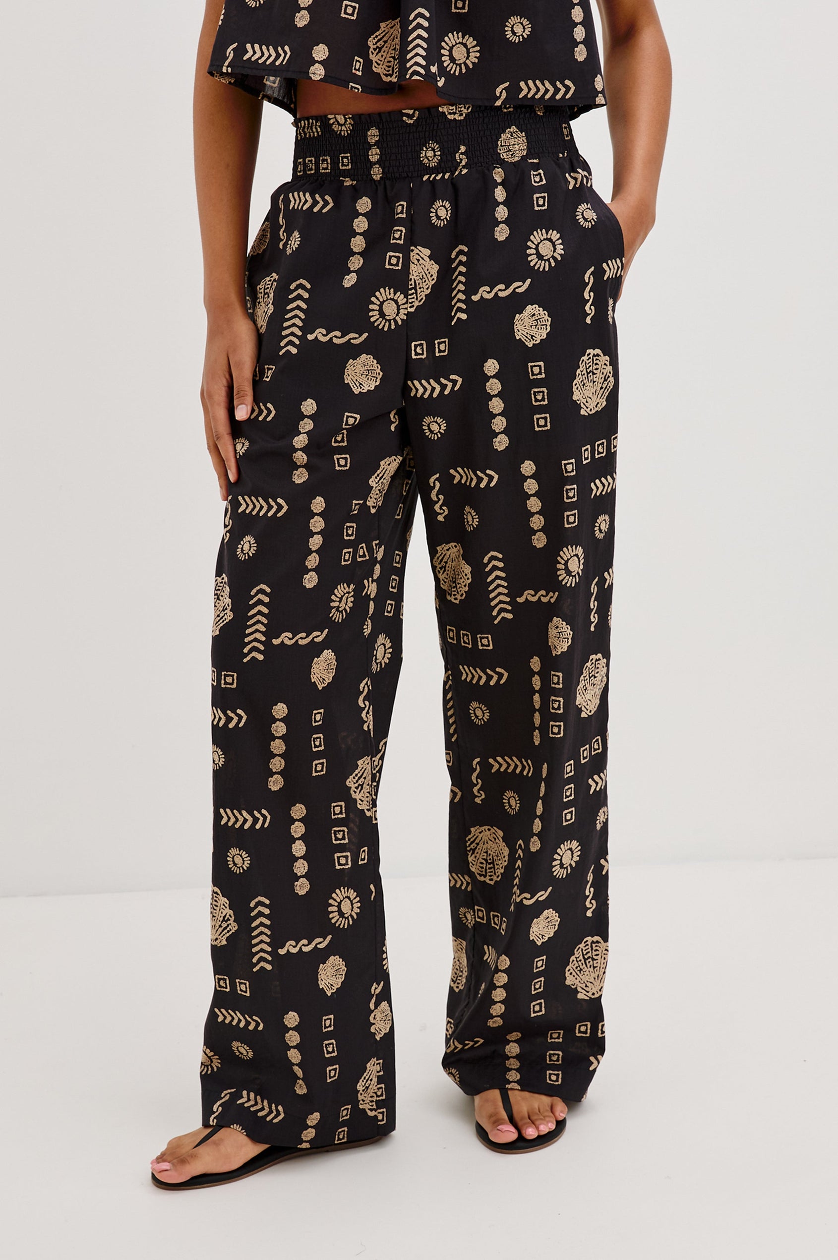 Brendon Pull on Pants with Wide Elastic Gathered Waistband, Relaxed fit and Side Slash Pockets in Beach Shells Colorway. Front View Shown on Model.