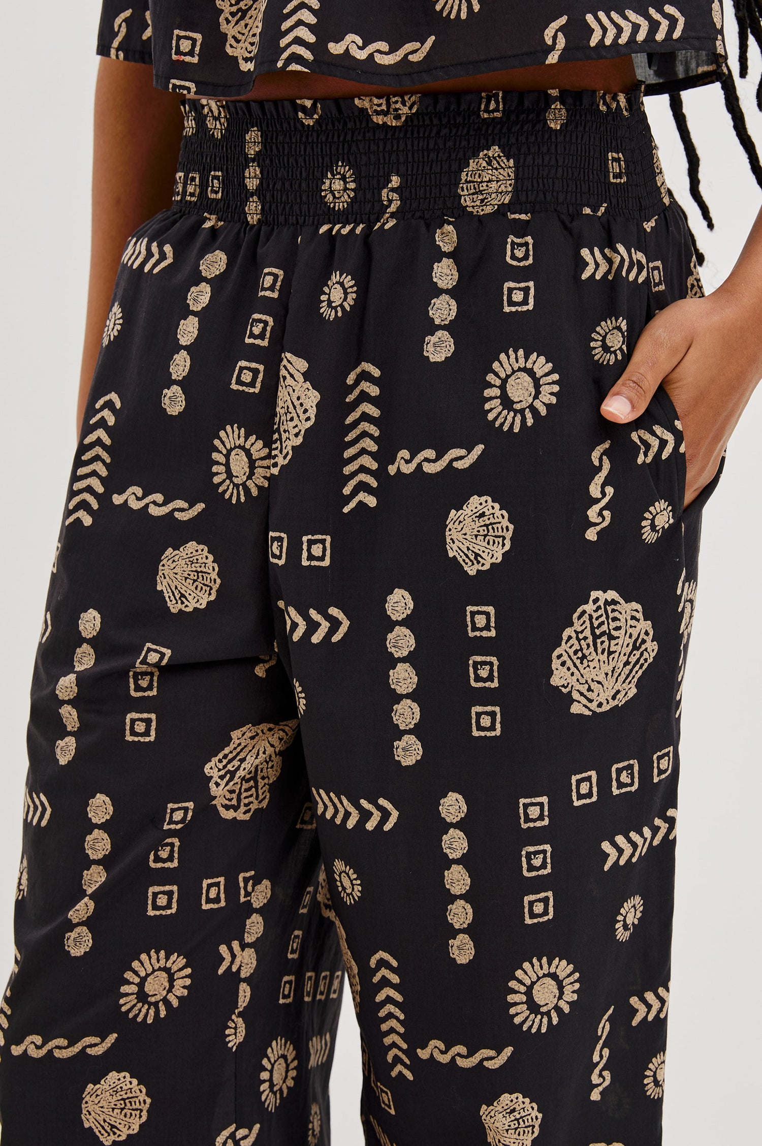 Brendon Pull on Pants with Wide Elastic Gathered Waistband, Relaxed fit and Side Slash Pockets in Beach Shells Colorway. Front Detailed View Shown on Model.