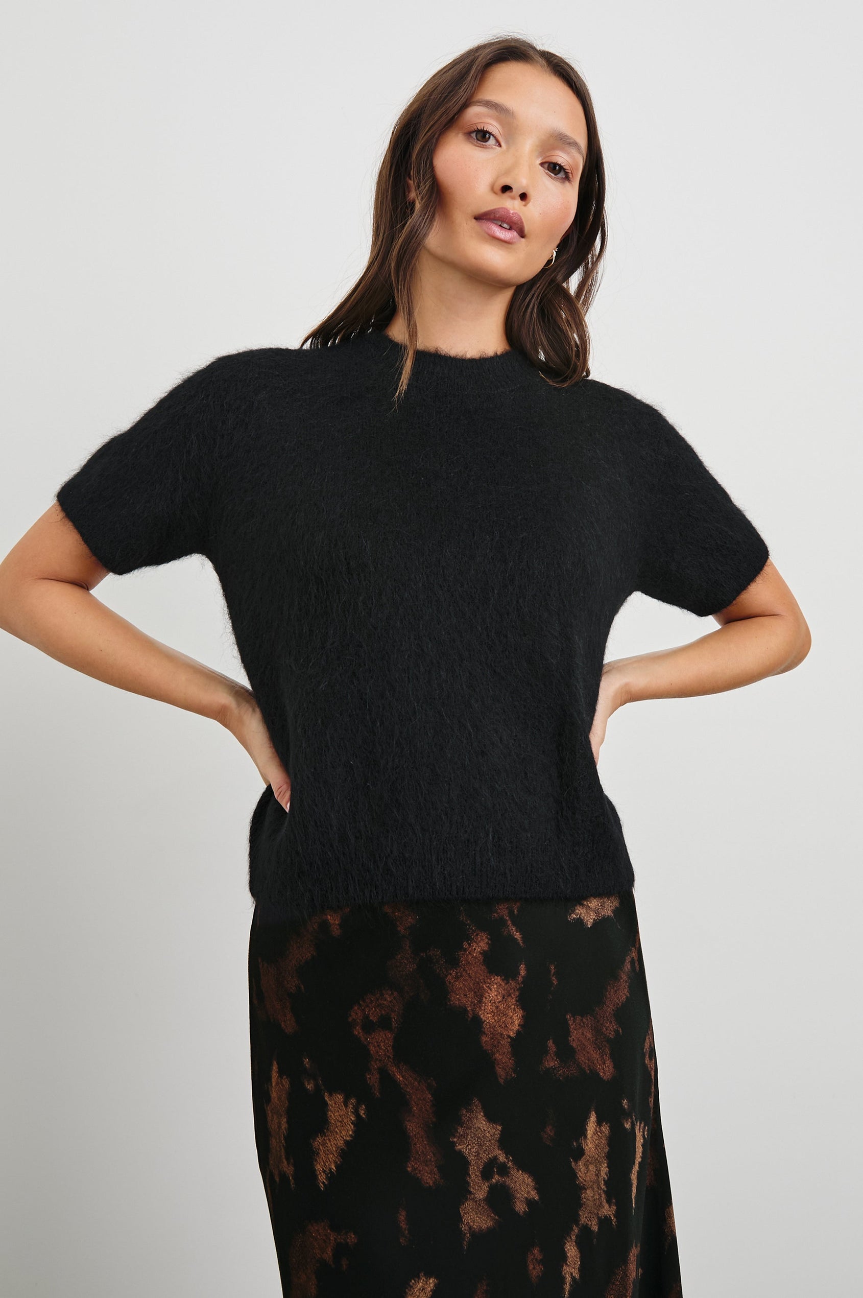 Briar Short-Sleeve Top with a Crew Neck and Ribbed Trim in Black Colorway - Front View Featured on Model