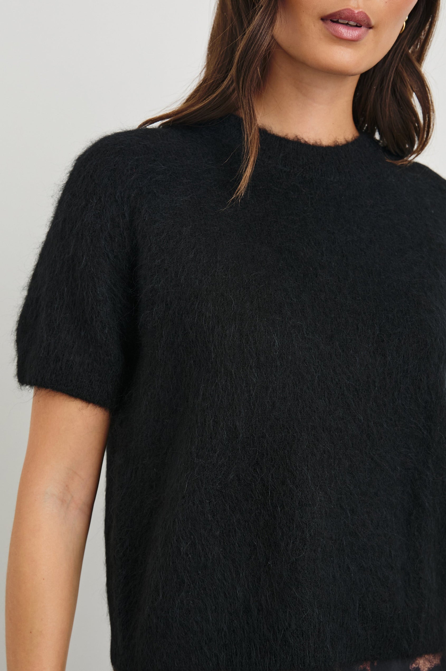 Briar Short-Sleeve Top with a Crew Neck and Ribbed Trim in Black Colorway - Front View Featured on Model