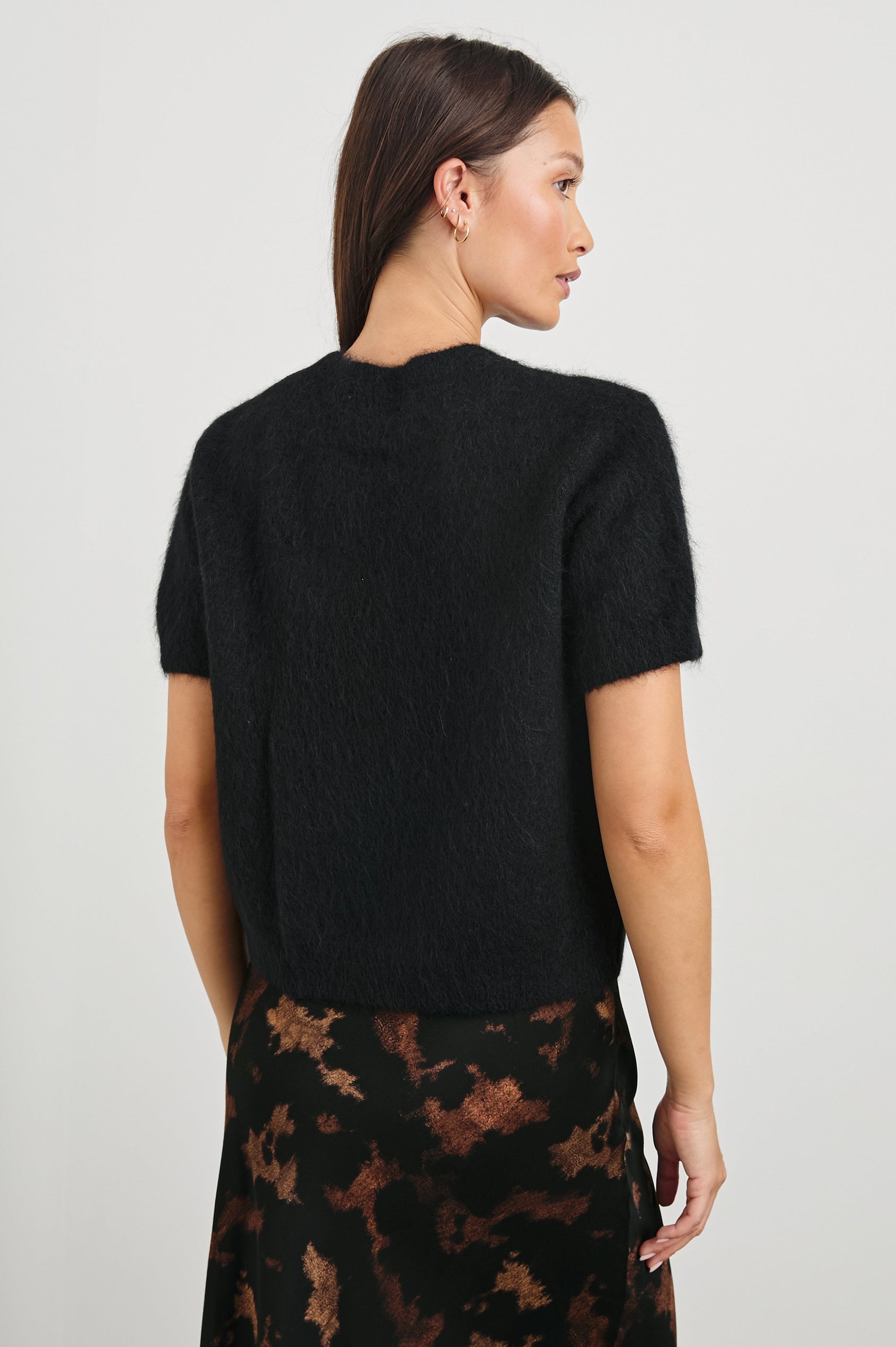 Briar Short-Sleeve Top with a Crew Neck and Ribbed Trim in Black Colorway - Back View Featured on Model
