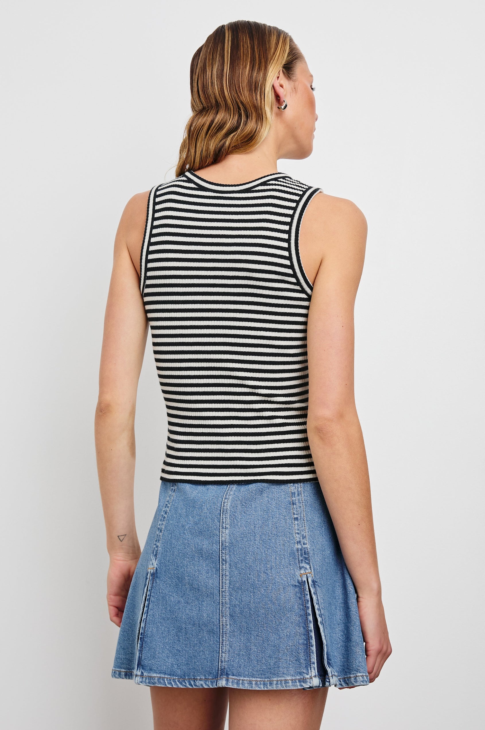 Broad Denim Mini Skirt with Two Front and Back Box Pleats and a Fabric Belt in Bristol Colorway, a blue - Back View Featured on Model