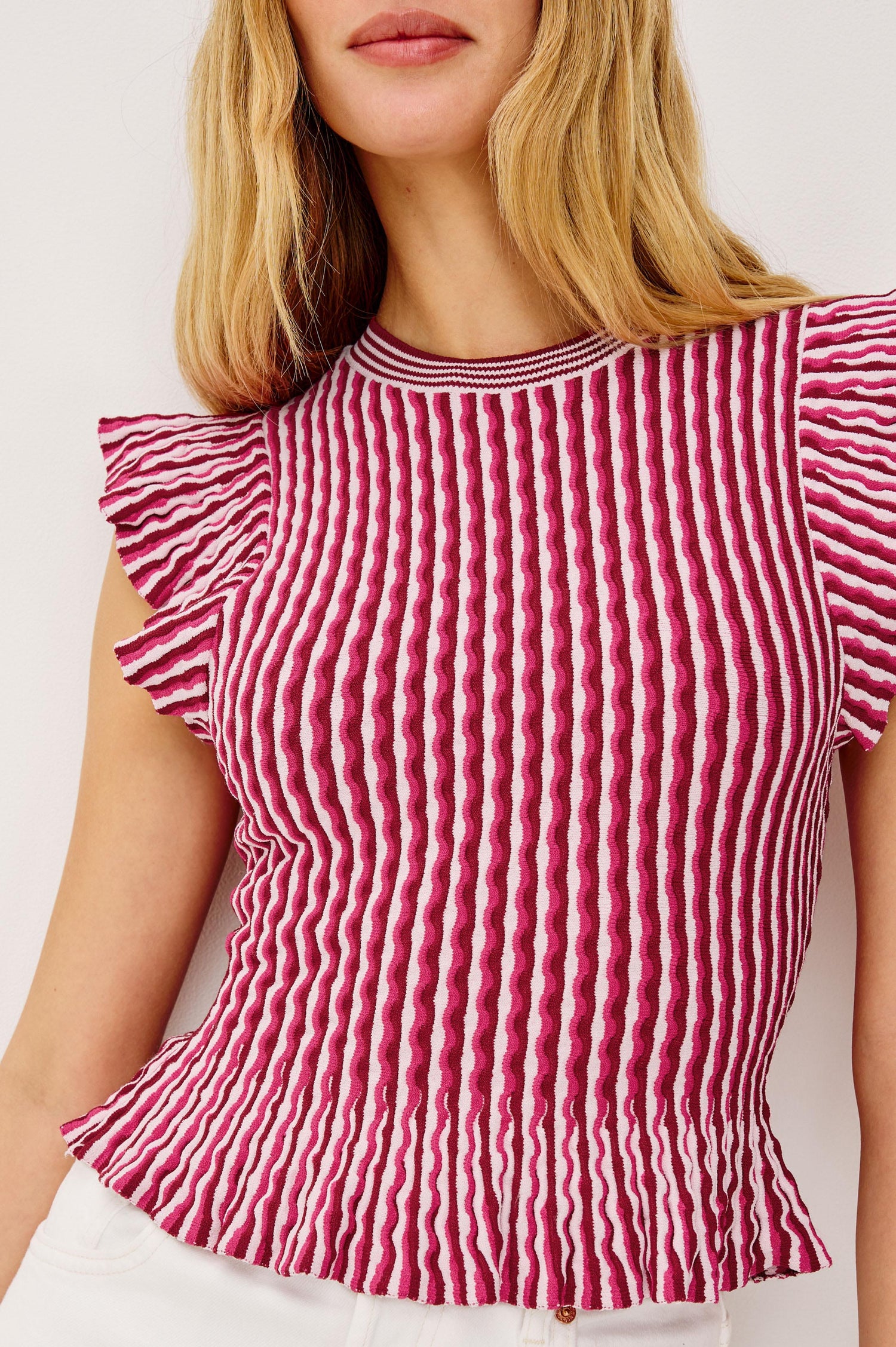 Bryn Fitted Top in Compact Stretch Knit With Flutter Sleeves, Ribbed Crew Neckline, and Peplum Hem in Berry Stripe Colorway - Upper Body Front View Featured on Model