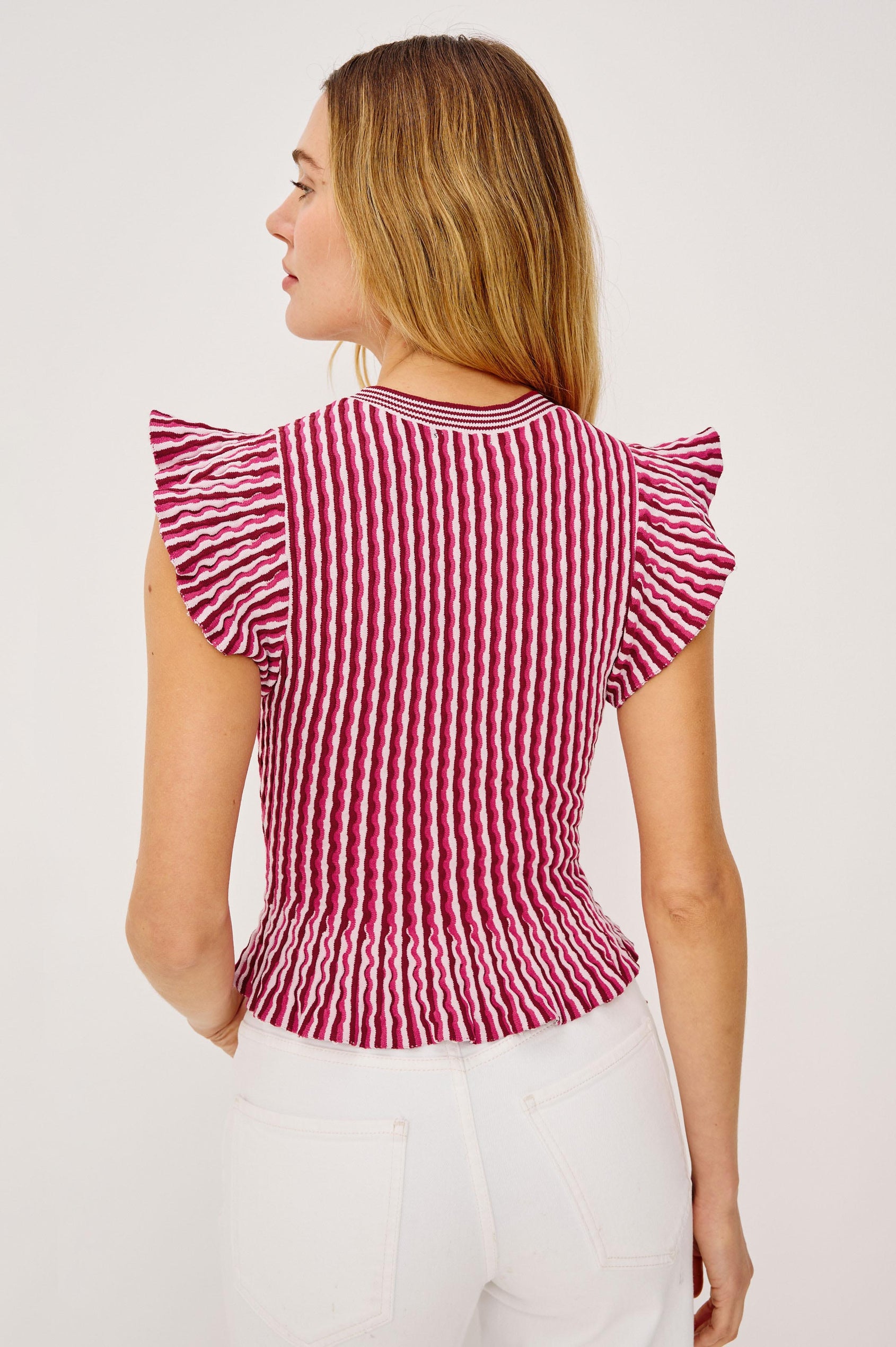 Bryn Fitted Top in Compact Stretch Knit With Flutter Sleeves, Ribbed Crew Neckline, and Peplum Hem in Berry Stripe Colorway - Upper Body Back View Featured on Model