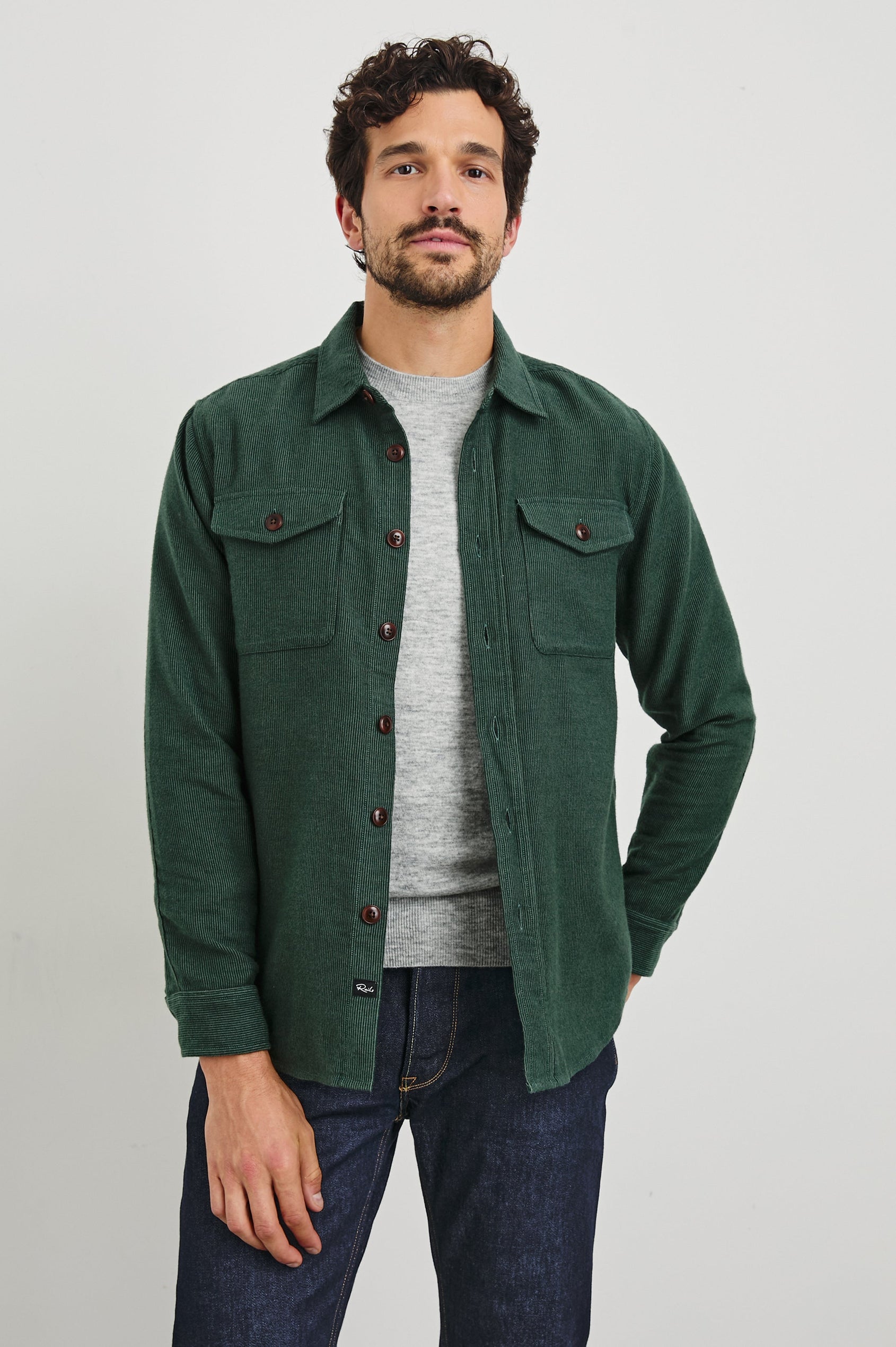 Burr Collared Shirt Jacket with Button Closure, Two Chest Button Flap Pockets and Textured Fabric in Creeping Vine Colorway, a Green - Front Unbuttoned View Featured on Model
