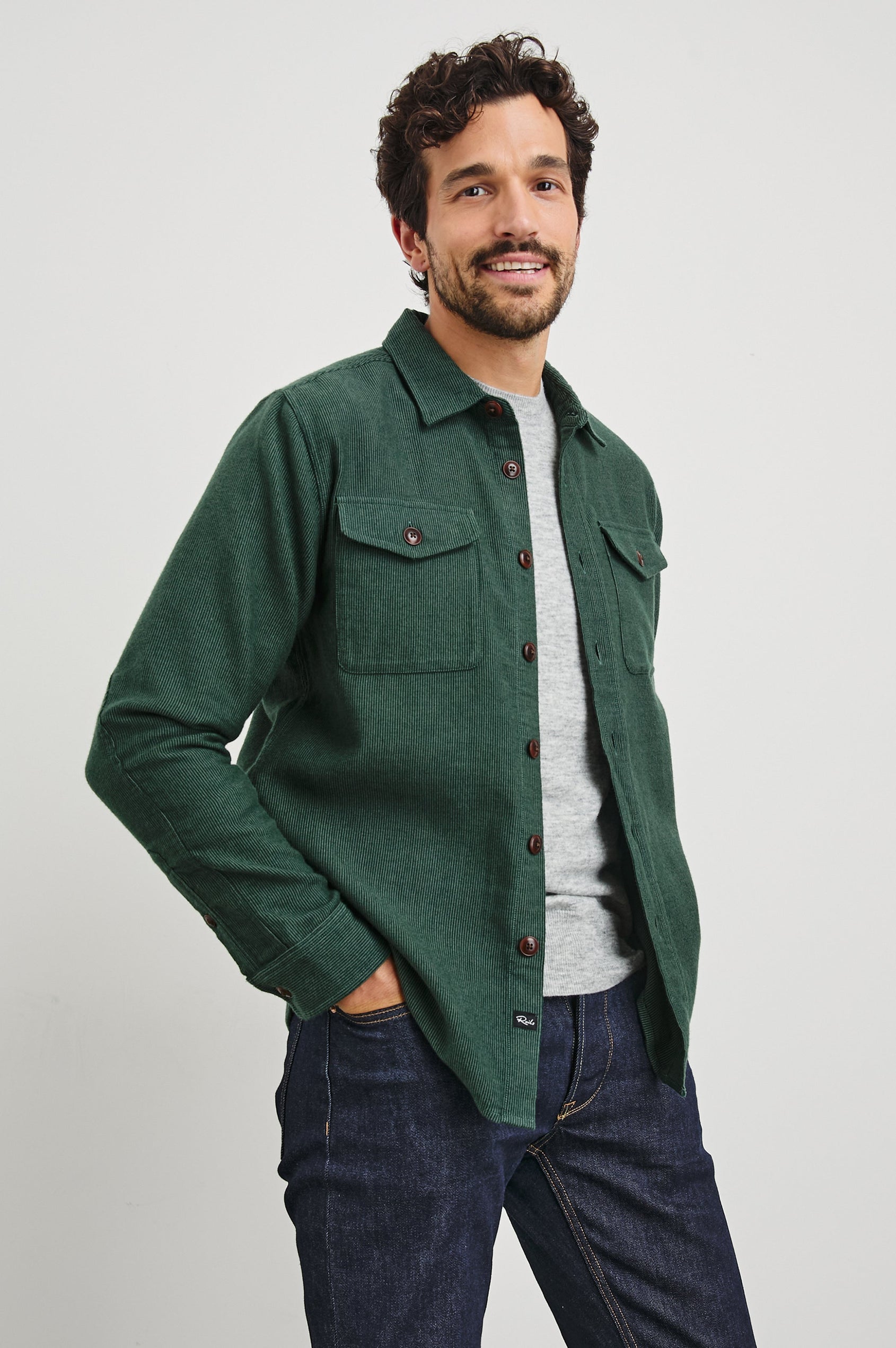 Burr Collared Shirt Jacket with Button Closure, Two Chest Button Flap Pockets and Textured Fabric in Creeping Vine Colorway, a Green - Front Unbuttoned View Featured on Model