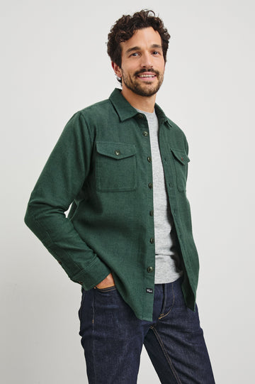 Burr Collared Shirt Jacket with Button Closure, Two Chest Button Flap Pockets and Textured Fabric in Creeping Vine Colorway, a Green - Front Unbuttoned View Featured on Model