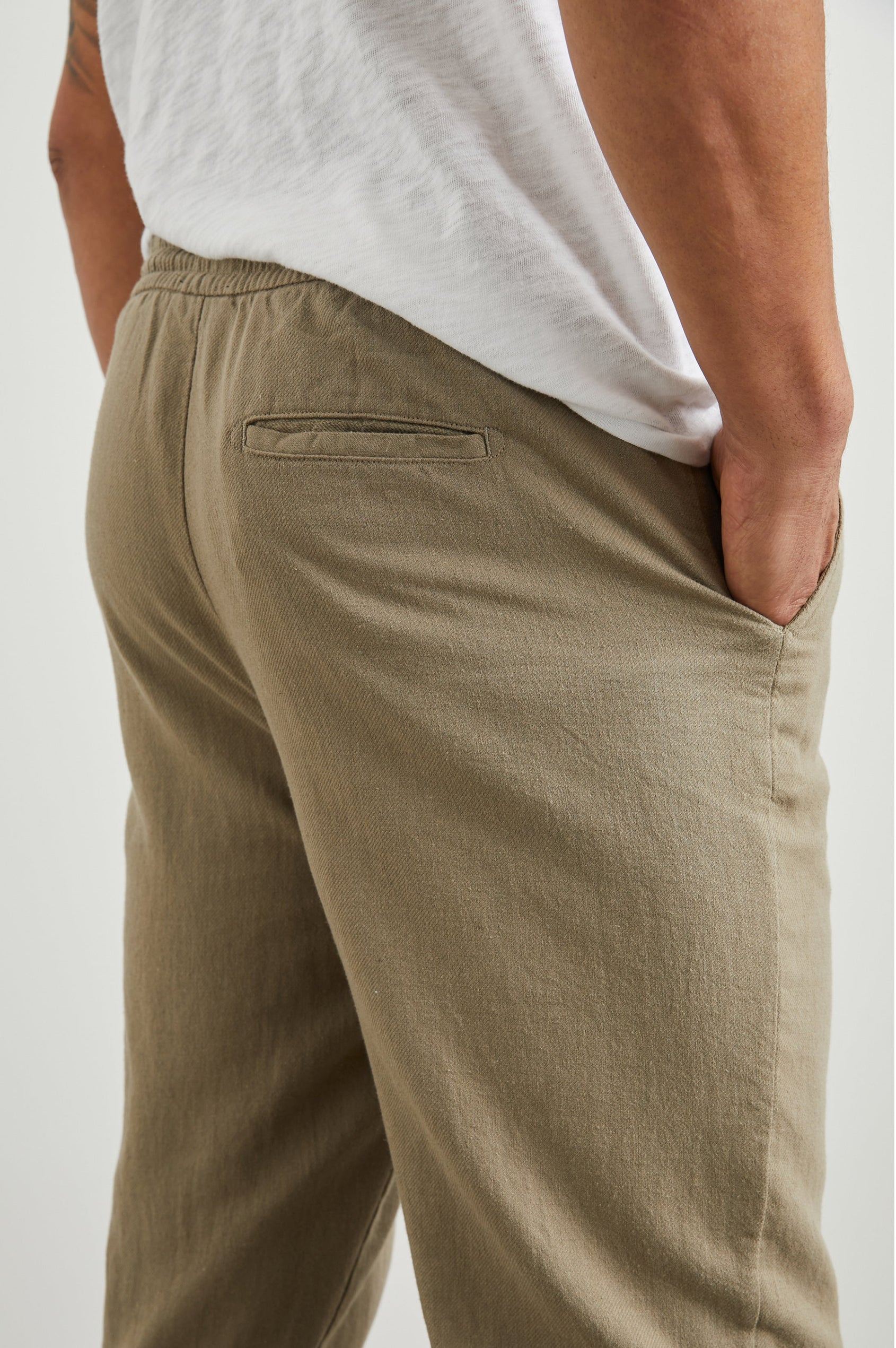 Callum Pants with a Drawstring Waist, Two Front Pockets and a Back Patch Pocket in Barley Colorway - Back View Featured on Model