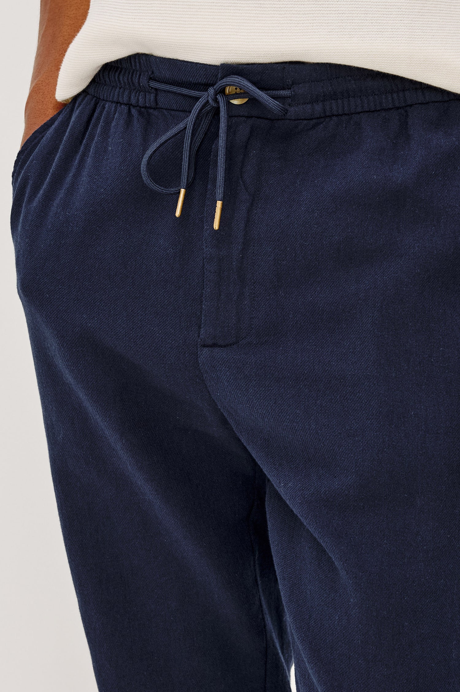 Callum Pants with a Drawstring Waist, Two Front Pockets and a Back Patch Pocket in Deep Meridian Colorway - Front close-up View Featured on Model