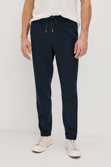 Callum extended length linen straight leg pant with elastic waistband and adjustable drawstring in Deep Meridian - front view on model