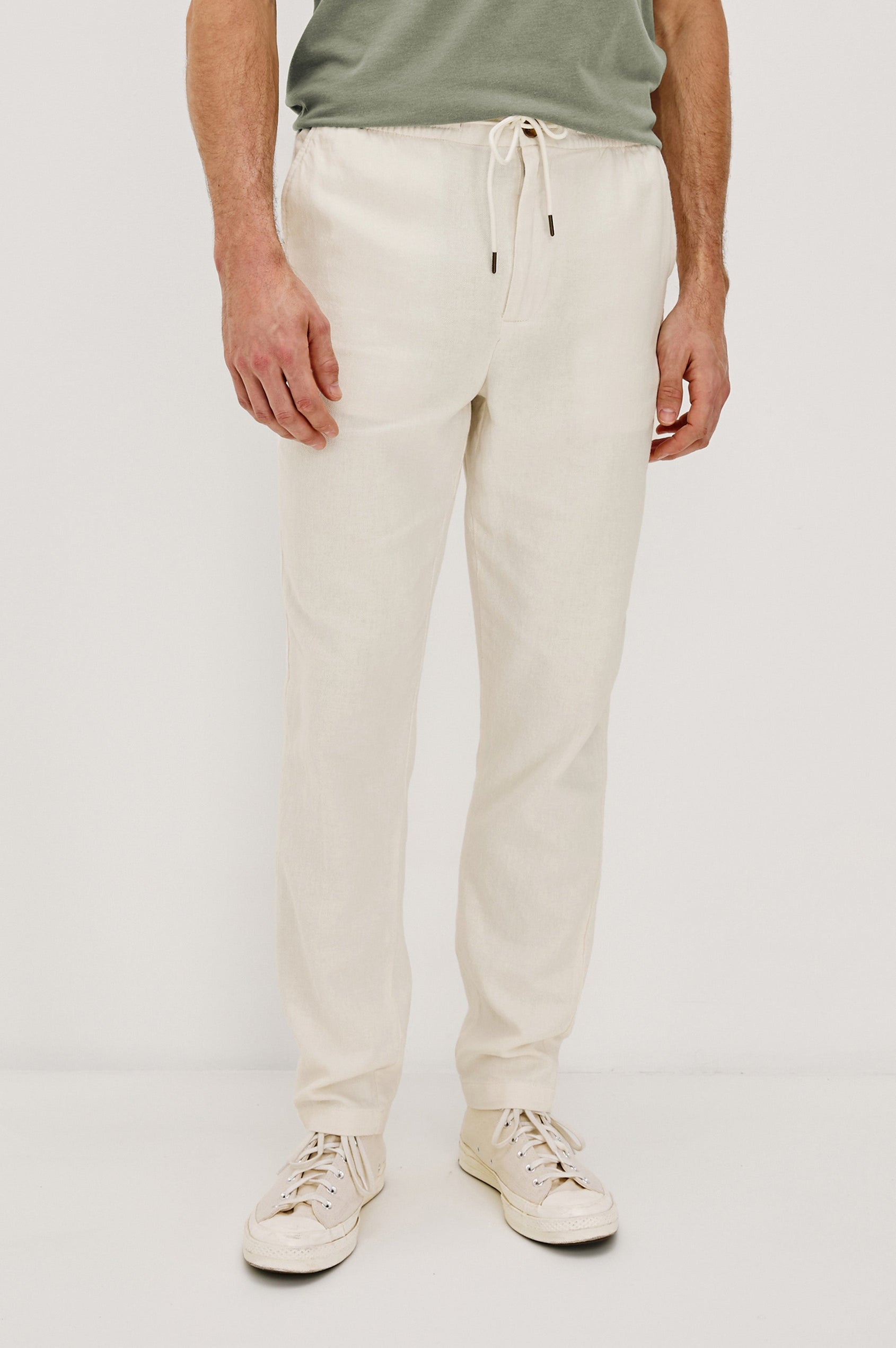 Callum extended length linen straight leg pant with elastic waistband and adjustable drawstring in Ecru - front view on model