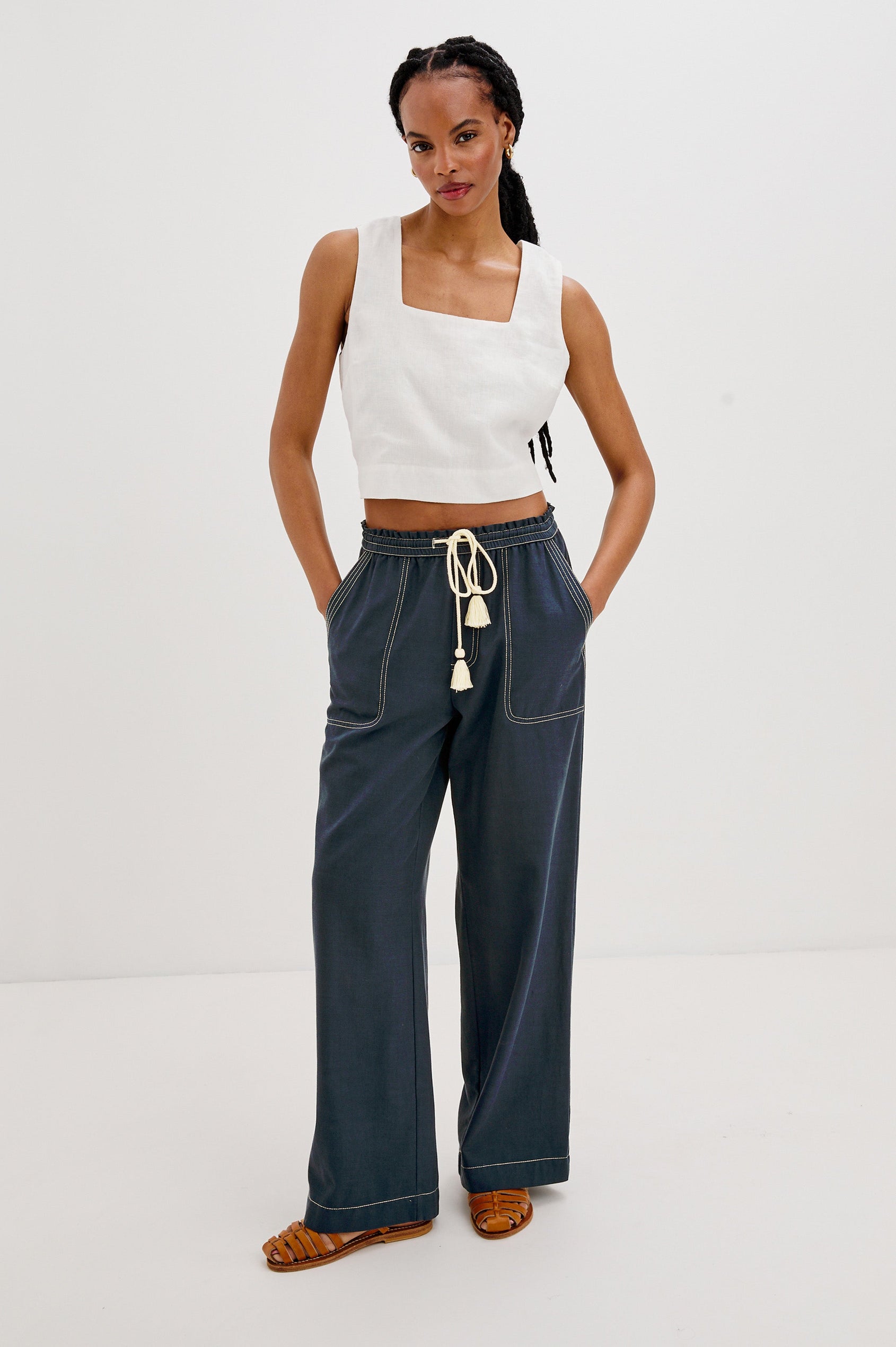 Campo Wide Leg Pant with Drawstring Waistband, Front Utility Patch Pockets and Contrast White Stitching in Navy Colorway. Front View Shown on Model.