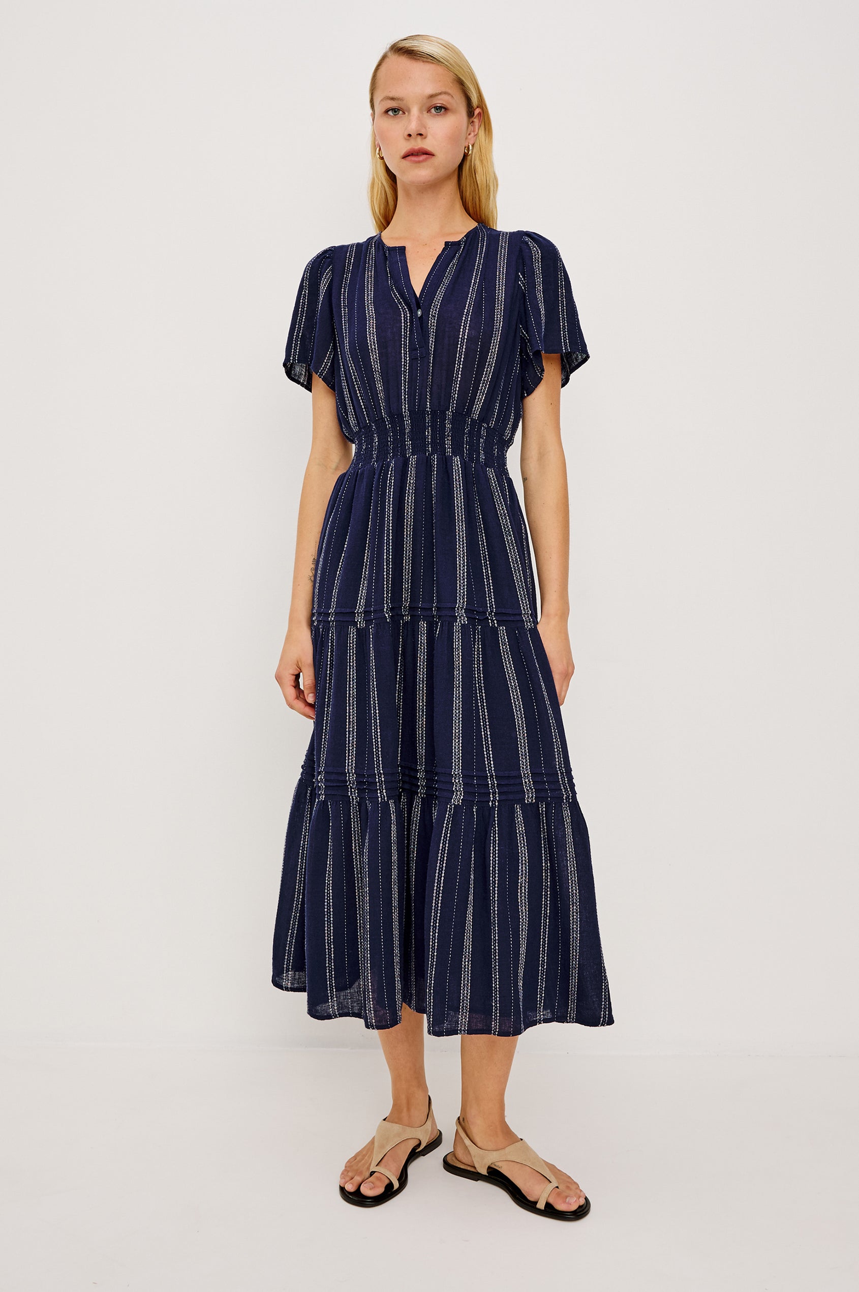 Cannes Midi Dress in Linen With Front Placket Short Sleeves and Smocked Elastic Waist in Marina Stripe Colorway - Full Body Front View Featured on Model