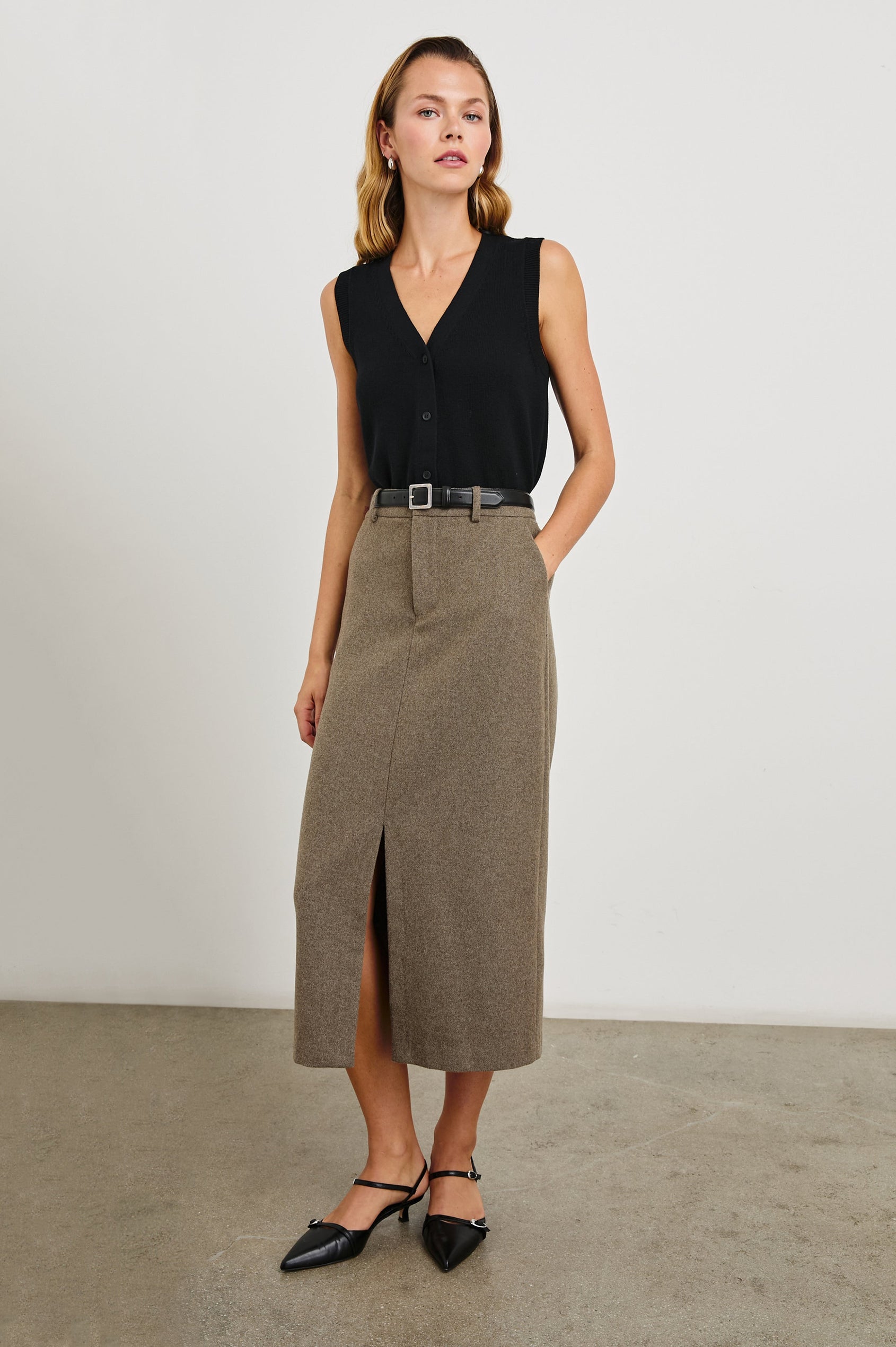 Carolina Midi Skirt with a Center Slit, Belt Loops, Two Front Pockets and Two Back Welt Pockets in Hazelnut Colorway - Front Full Body View Featured on Model 
