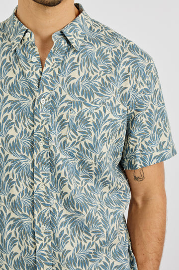 Carson Collared Button Front Shirt with Short Sleeves and a Chest Pocket in Ecru Banana Leaf Colorway. Front View Shown on Model.