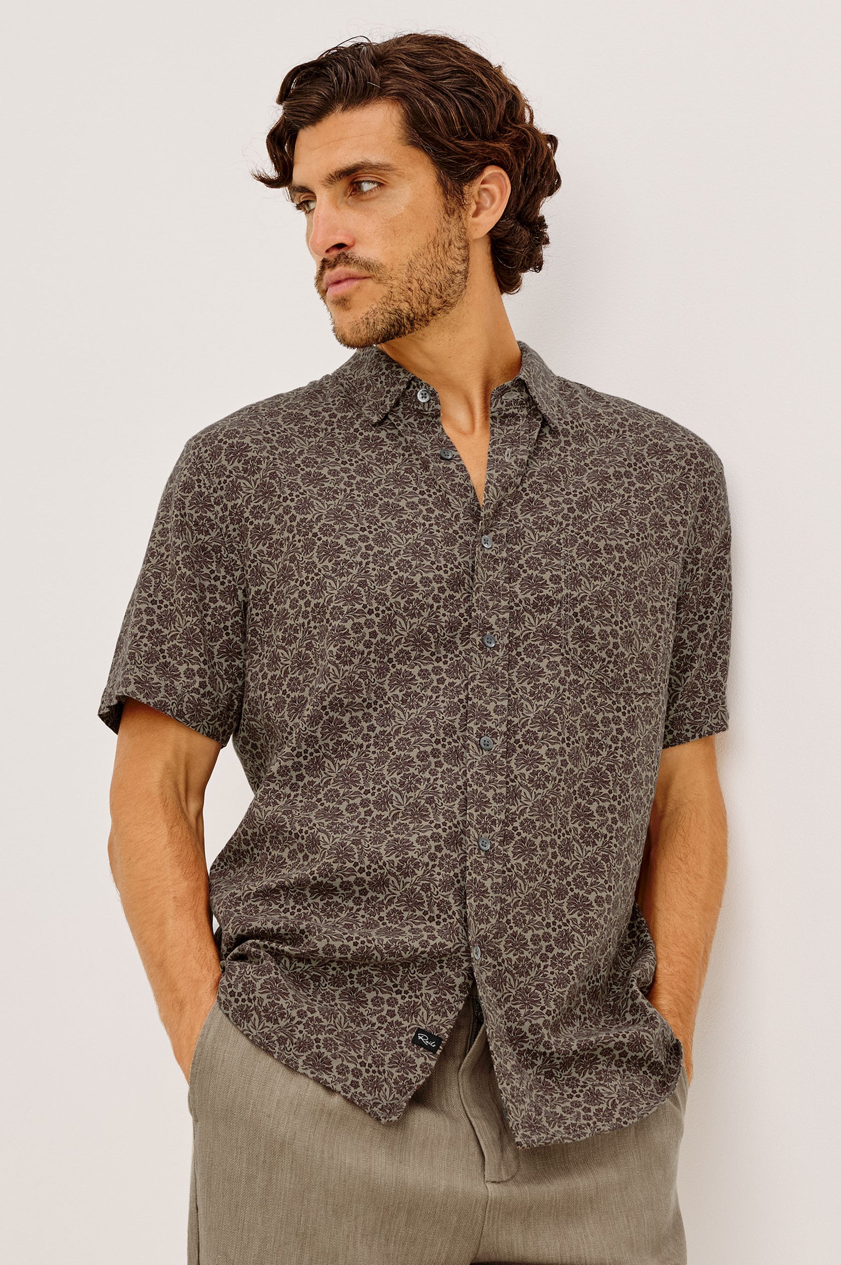 Carson Shirt in Linen With Short Sleeves, Relaxed Fit, and Chest Patch Pocket in Red Rock Floral Colorway - Upper Body Front View Featured on Model