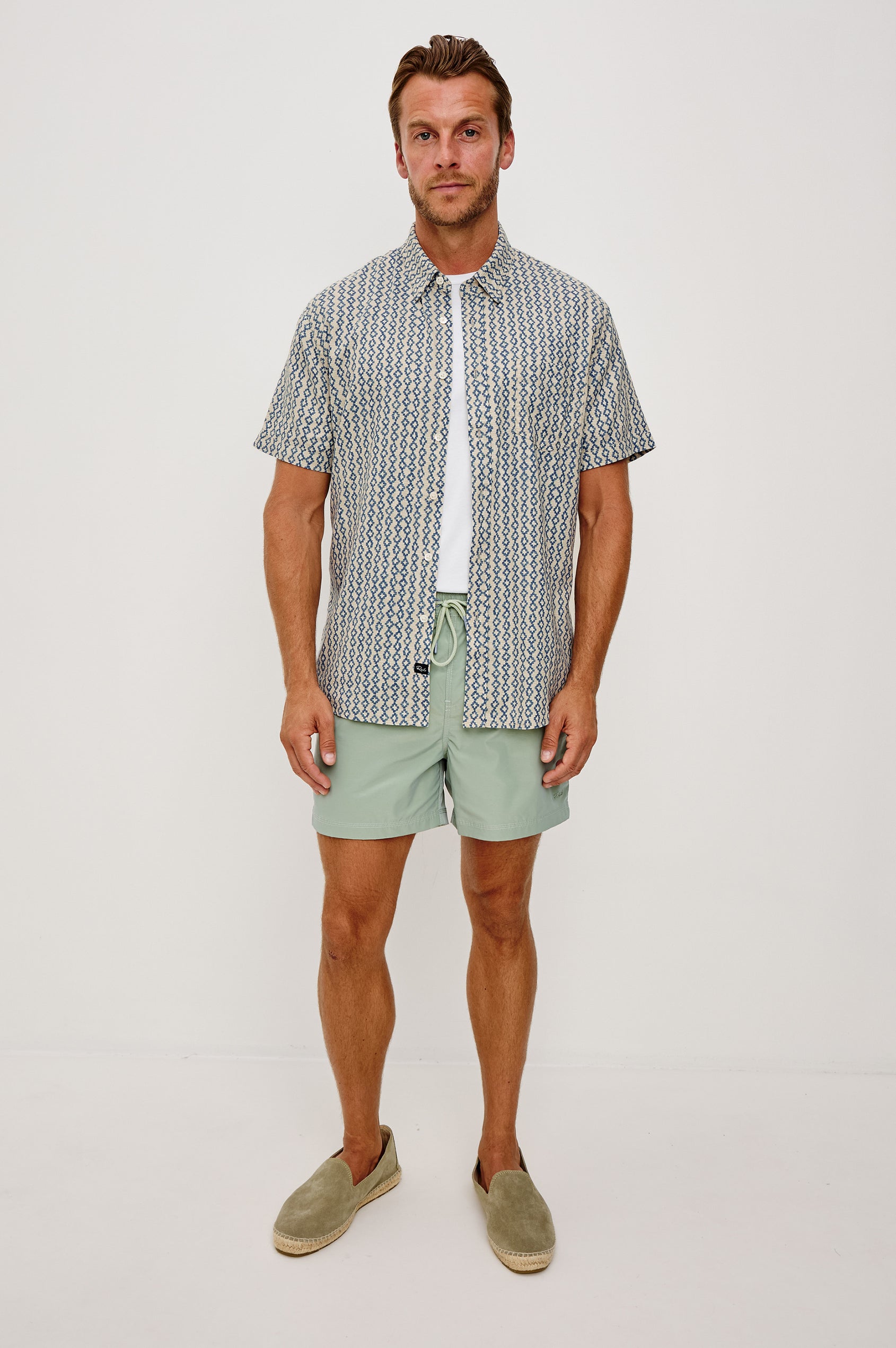 Carson Button-Up Short Sleeve Shirt in Linen Blend With Collar and Classic Fit in Wavy Batik Coast Colorway - Full Body Front View Featured on Model
