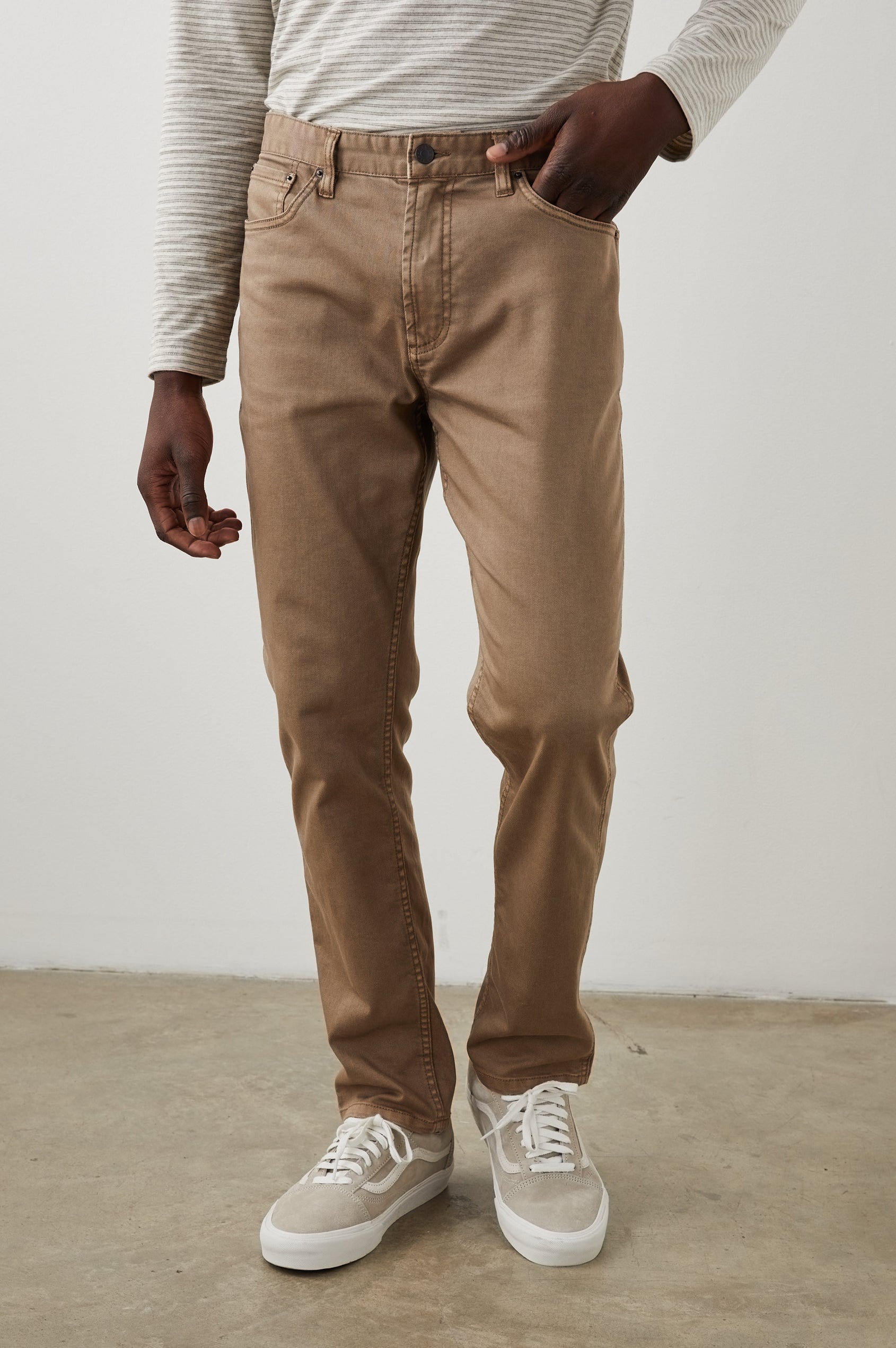 Carver Pants with Belt Loops, Two Front Pockets plus a Coin Pocket and Two Back Patch Pockets in Cacao Colorway - Front View Featured on Model